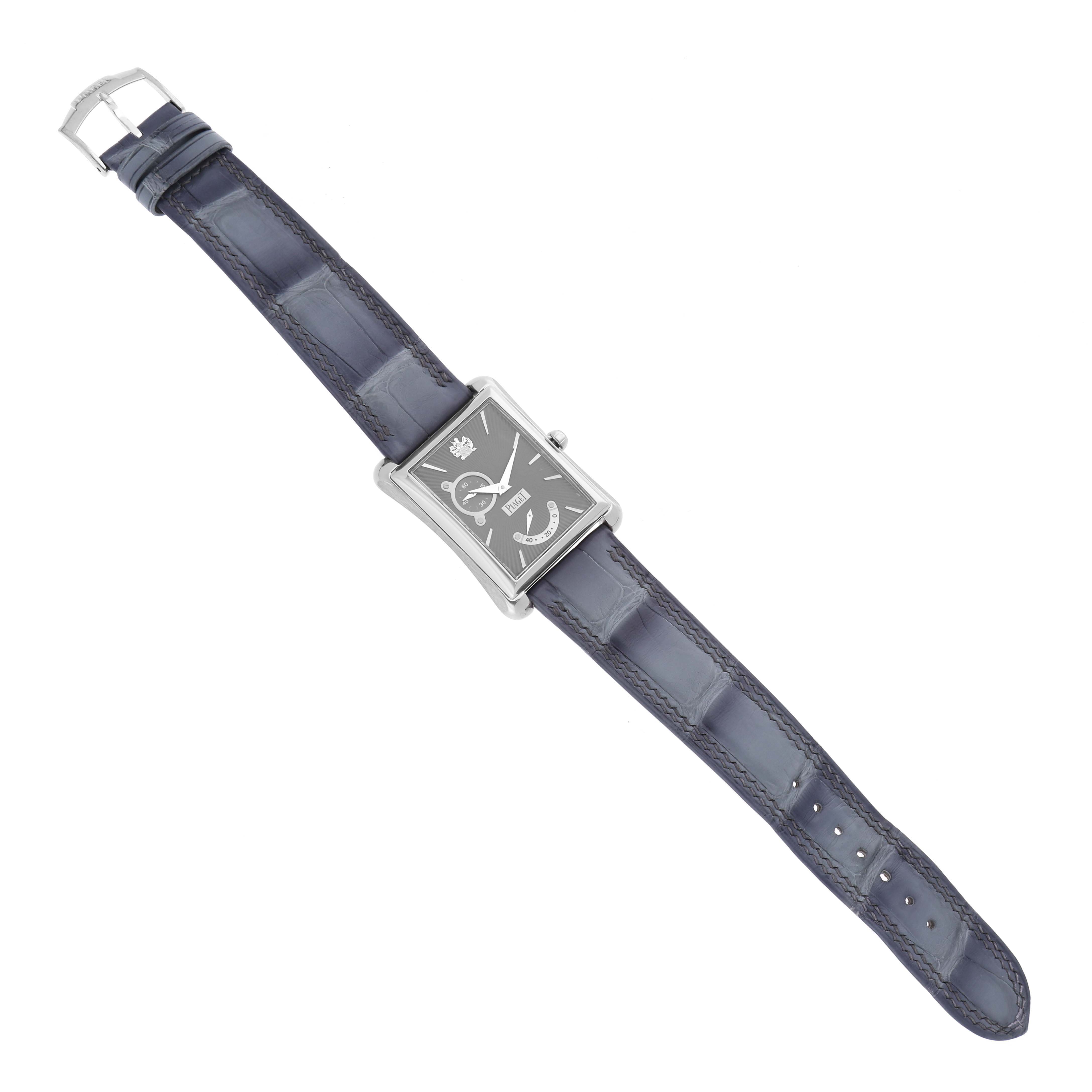 The Piaget P10566 Men's Yellow Gold Grey Dial P10566 Men's Yellow Gold Grey Dial Emperador Automatic P10566 watch is shown from a top-down angle, displaying its face and entire leather strap.