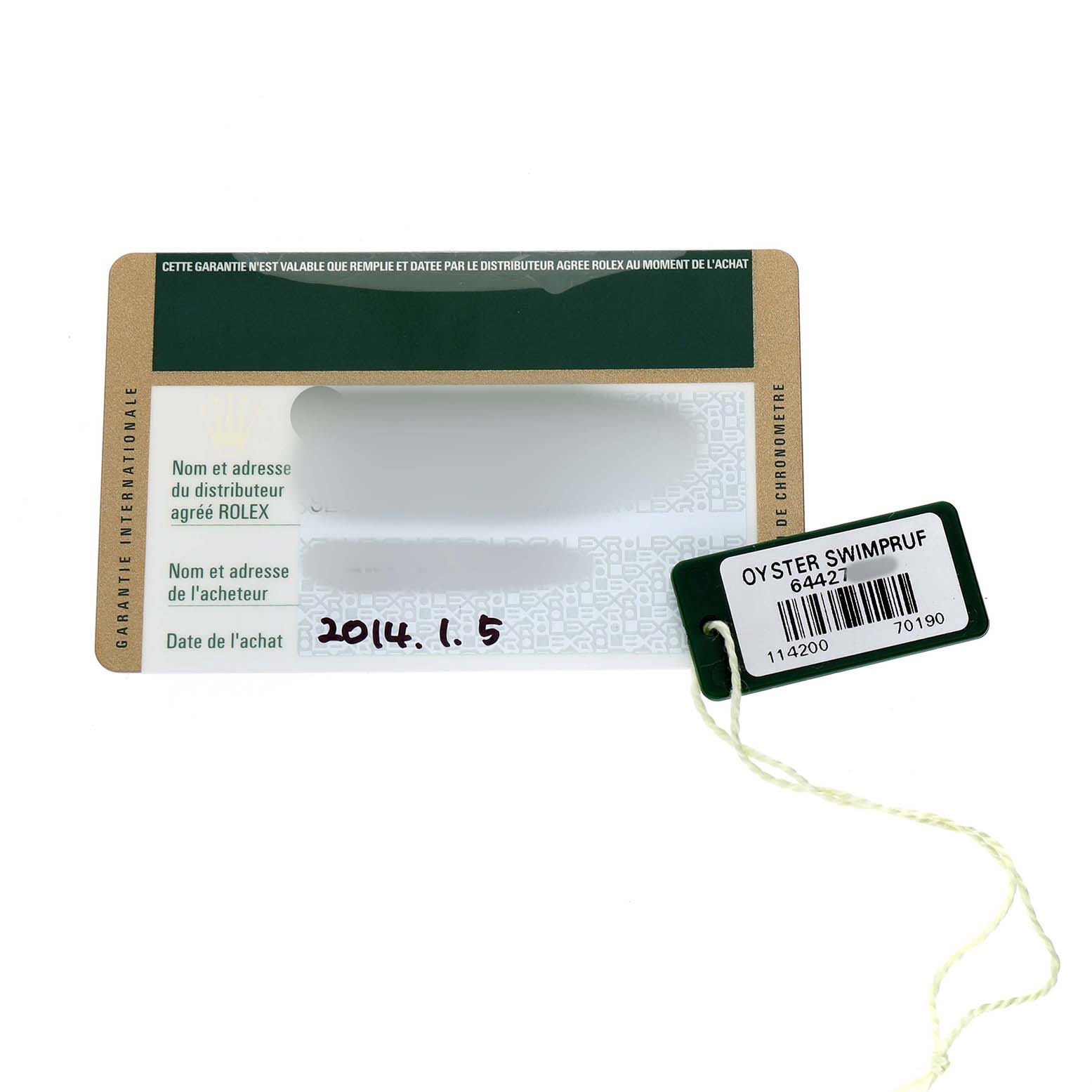 This image shows a warranty card and an Oyster Swimpruf tag for the Rolex Air-King 114200 Men's Stainless Steel White Dial watch.