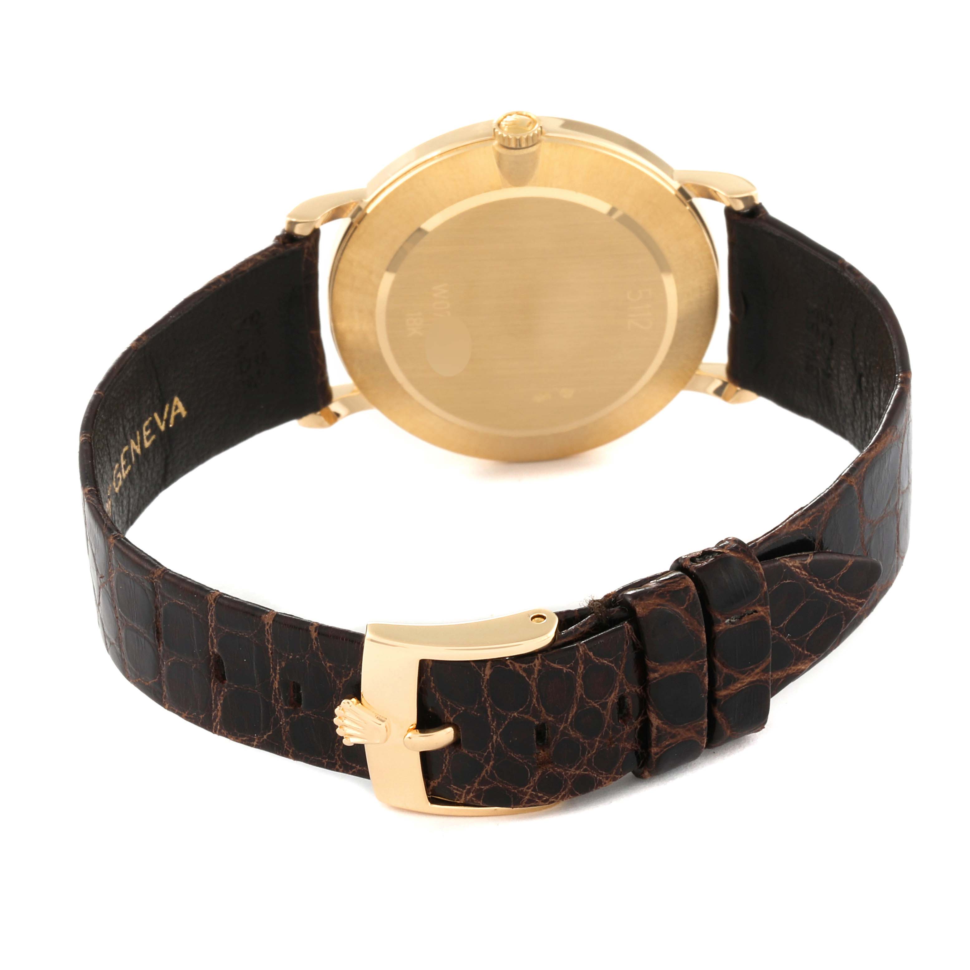 The image shows the back and buckle of a Rolex Cellini 5112/8 Men
s Yellow Gold Champagne Dial 5112/8 Men
s Yellow Gold Champagne Dial watch, featuring a gold case and an alligator leather strap.