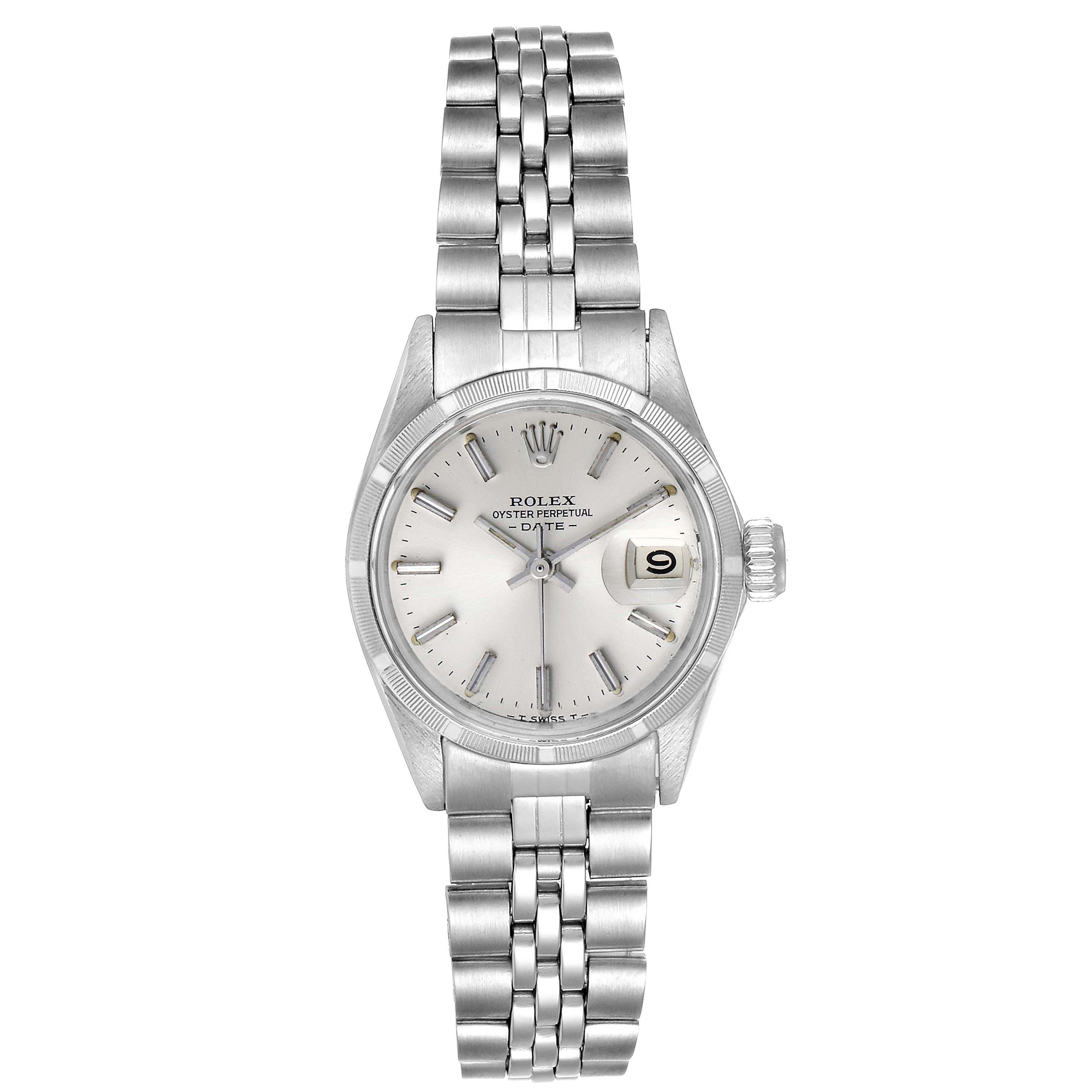 This image shows a Rolex Date 6519 Women
s Stainless Steel Silver Dial 6519 Women
s Stainless Steel Silver Dial model watch from a frontal angle, displaying its face, bracelet, and crown.