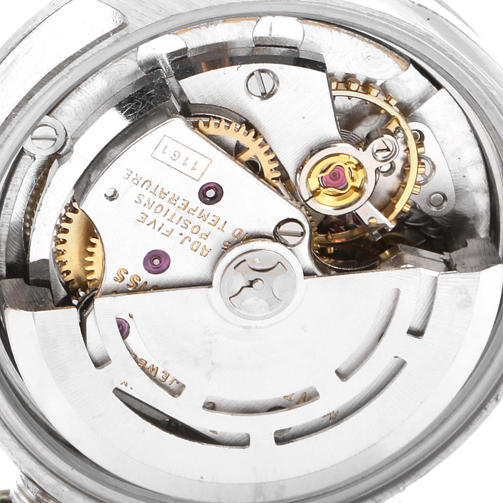 This image shows a close-up view of the movement mechanism of a Rolex Date 6519 Women
s Stainless Steel Silver Dial 6519 Women
s Stainless Steel Silver Dial model watch.