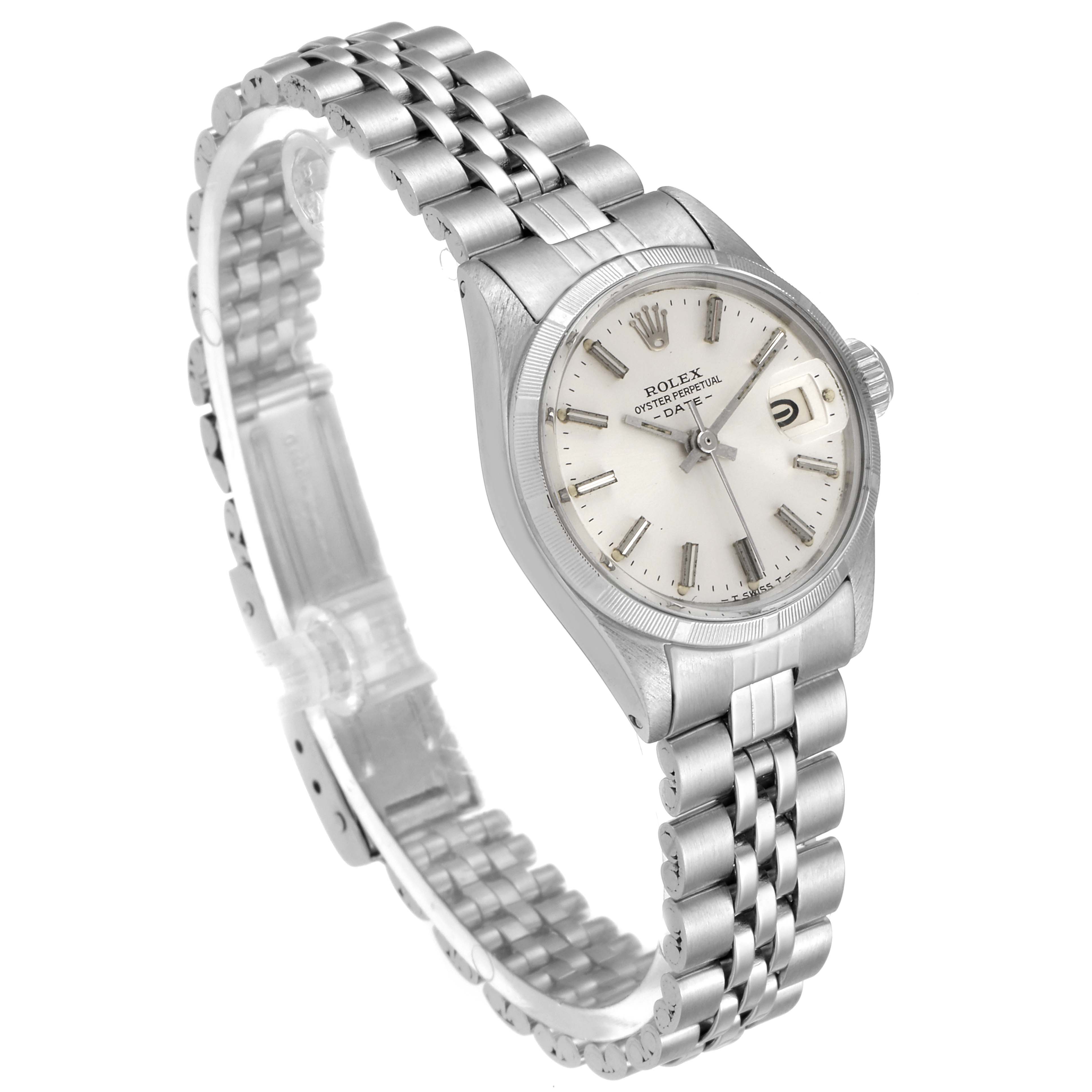 This image shows a Rolex Date 6519 Women
s Stainless Steel Silver Dial 6519 Women
s Stainless Steel Silver Dial model watch angled to display its face, bezel, crown, and bracelet.