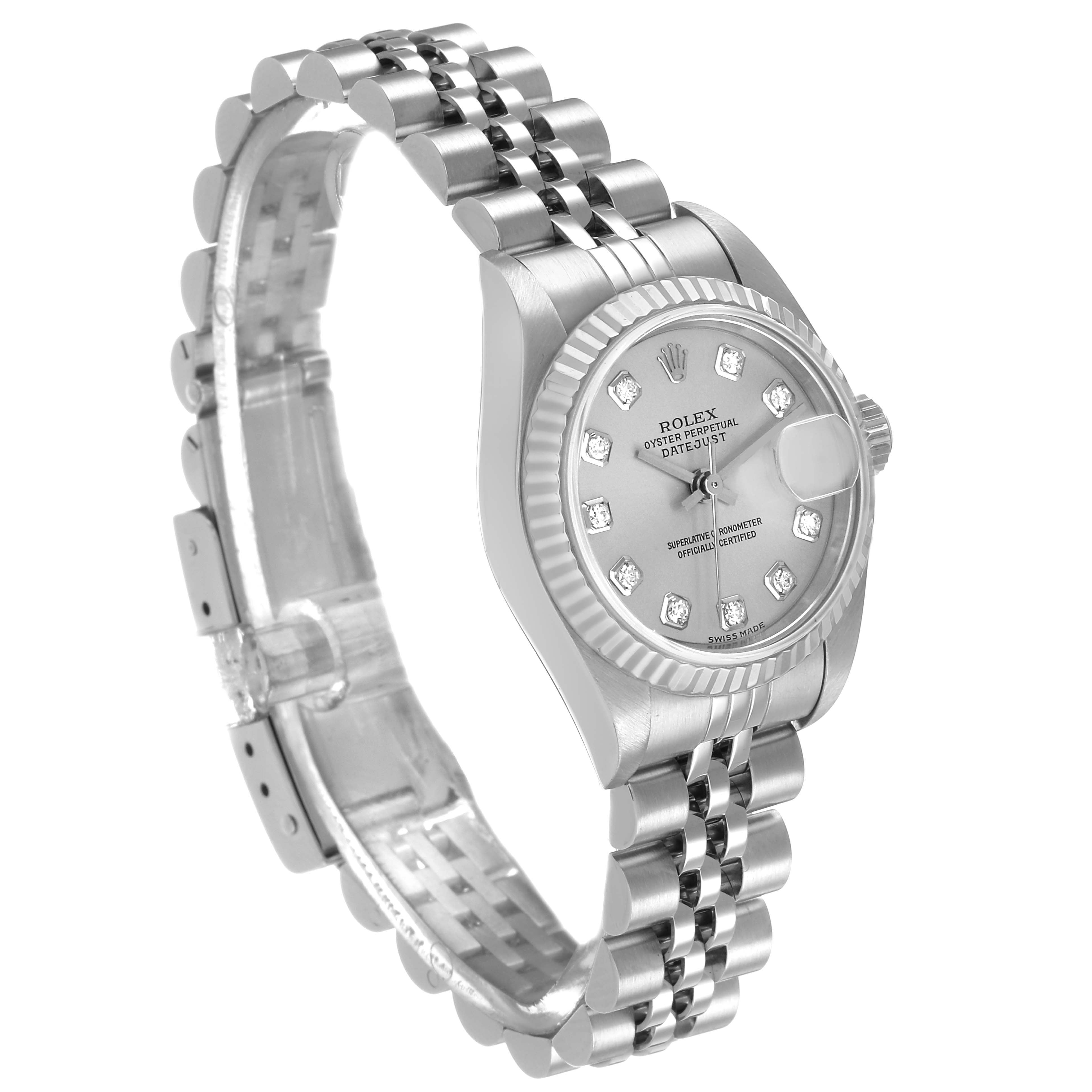 The Rolex Datejust 79174 Women's Stainless Steel Silver Dial watch is shown at a three-quarter angle, highlighting the dial, bezel, and Jubilee bracelet.