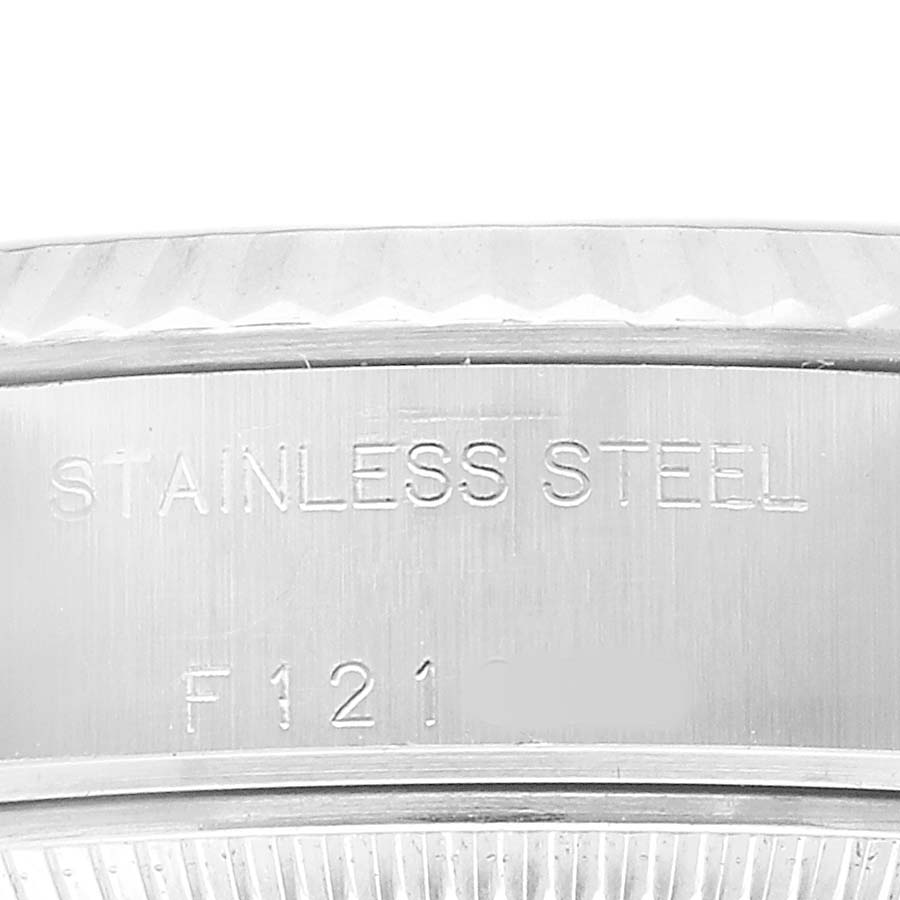The image shows a close-up of the stainless steel case back of the Rolex Datejust 79174 Women's Stainless Steel Silver Dial watch.