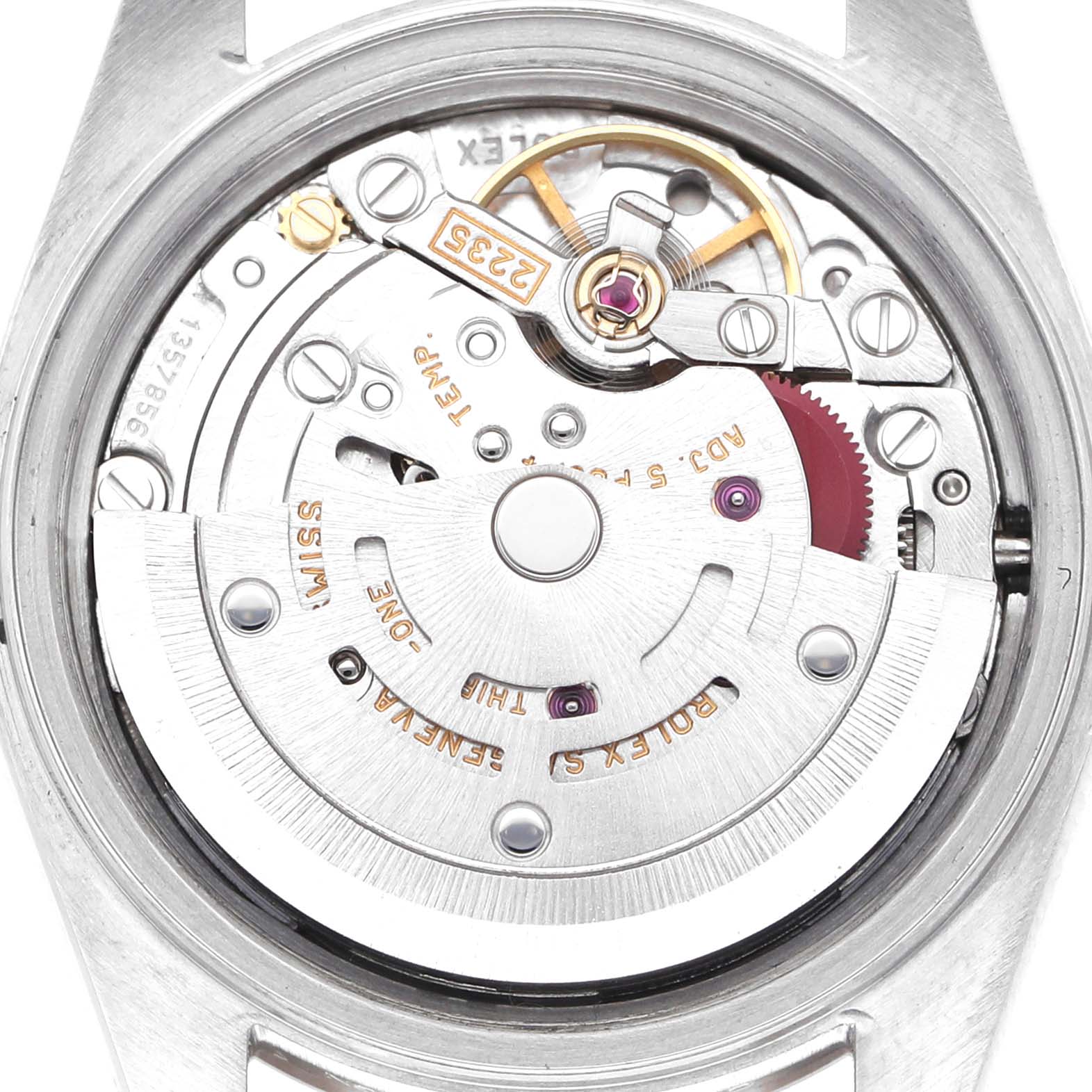 The image shows the movement of a Rolex Datejust 79174 Women's Stainless Steel Silver Dial watch from the back, highlighting the rotor and mechanism.