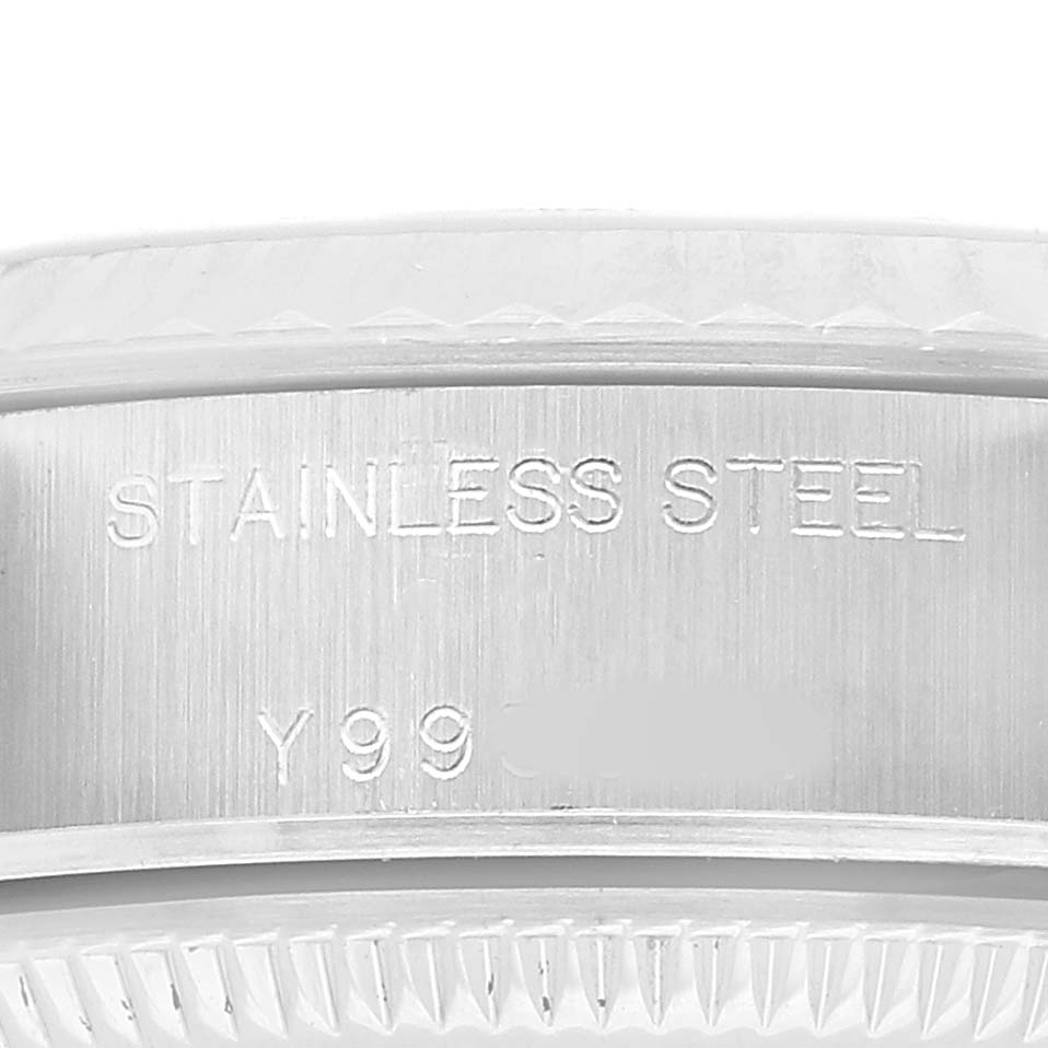 The image shows a close-up of the Rolex Datejust 79174 Women's Stainless Steel Silver Dial's stainless steel part, focusing on the engraved text.