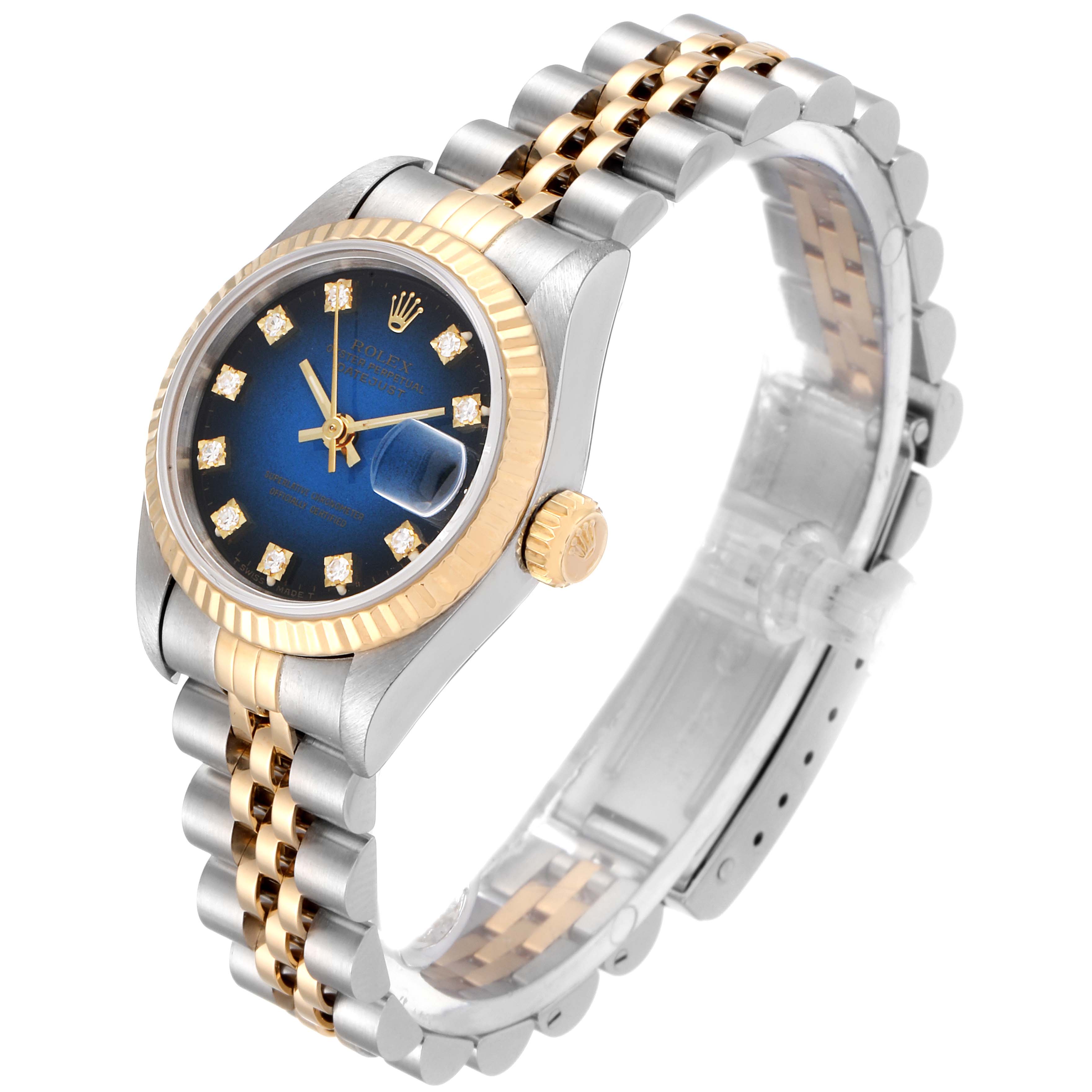 The Rolex Datejust 69173 Women's Steel and Gold (two tone) Blue Dial 69173 Women's Steel and Gold (two tone) Blue Dial watch is shown at an angle highlighting its face, bezel, crown, and two-tone bracelet.