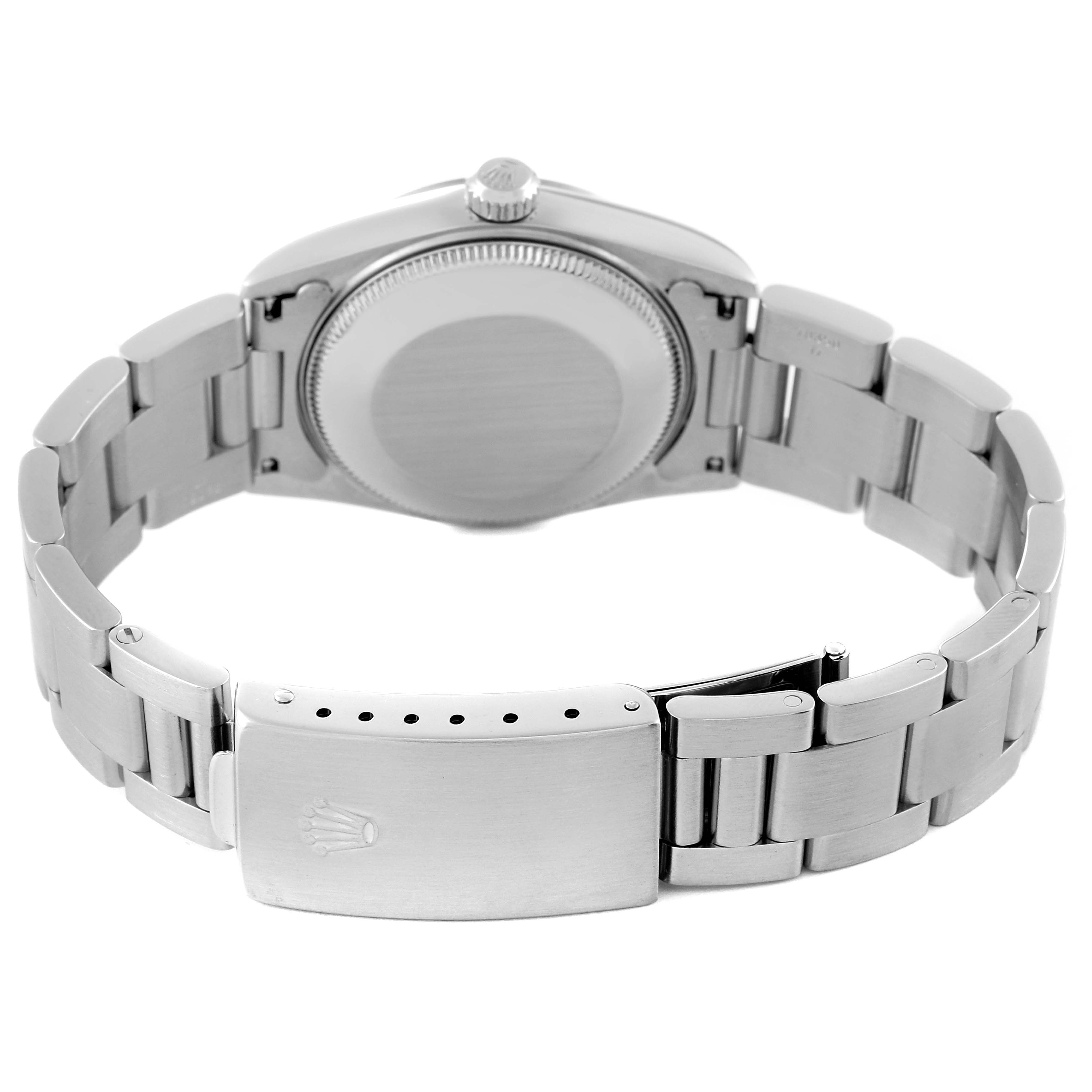 The image shows the back view of a Mid-Size Rolex watch, highlighting the case back and the clasp on the bracelet.