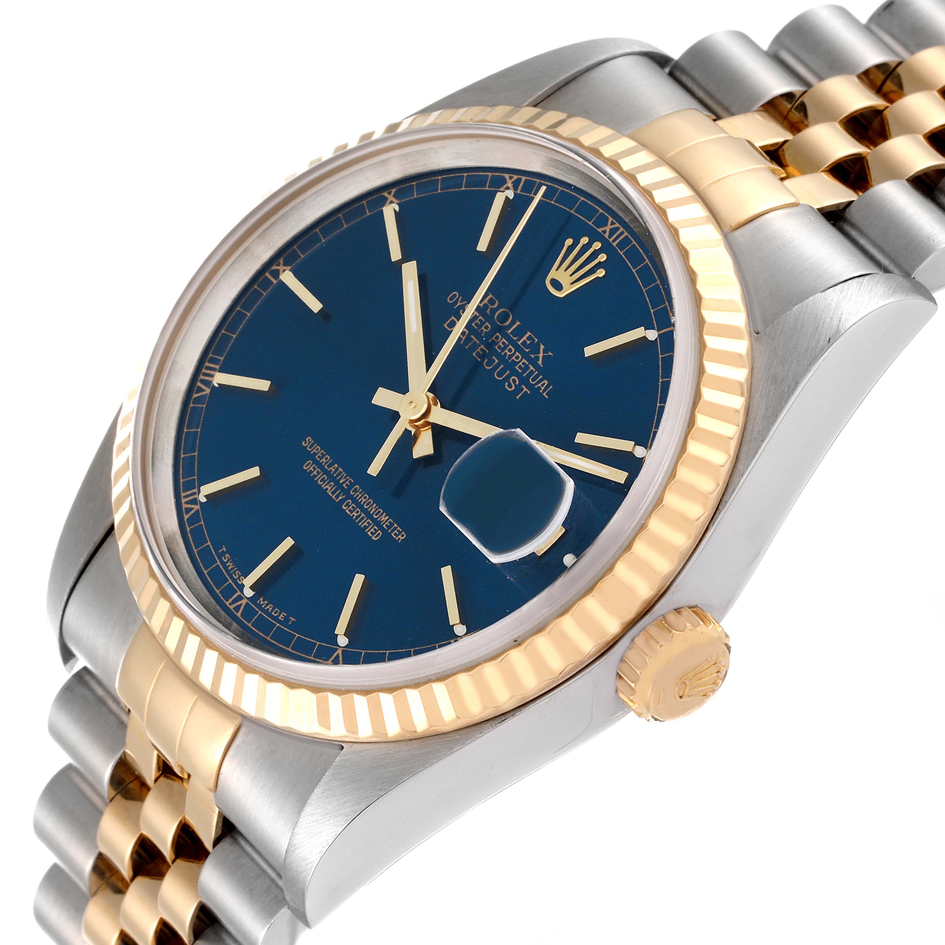 This image shows the front and side angle of a Rolex Datejust 16233 Men's Steel and Gold (two tone) Blue Dial 16233 Men's Steel and Gold (two tone) Blue Dial watch, highlighting its blue dial, fluted bezel, and two-tone jubilee bracelet.