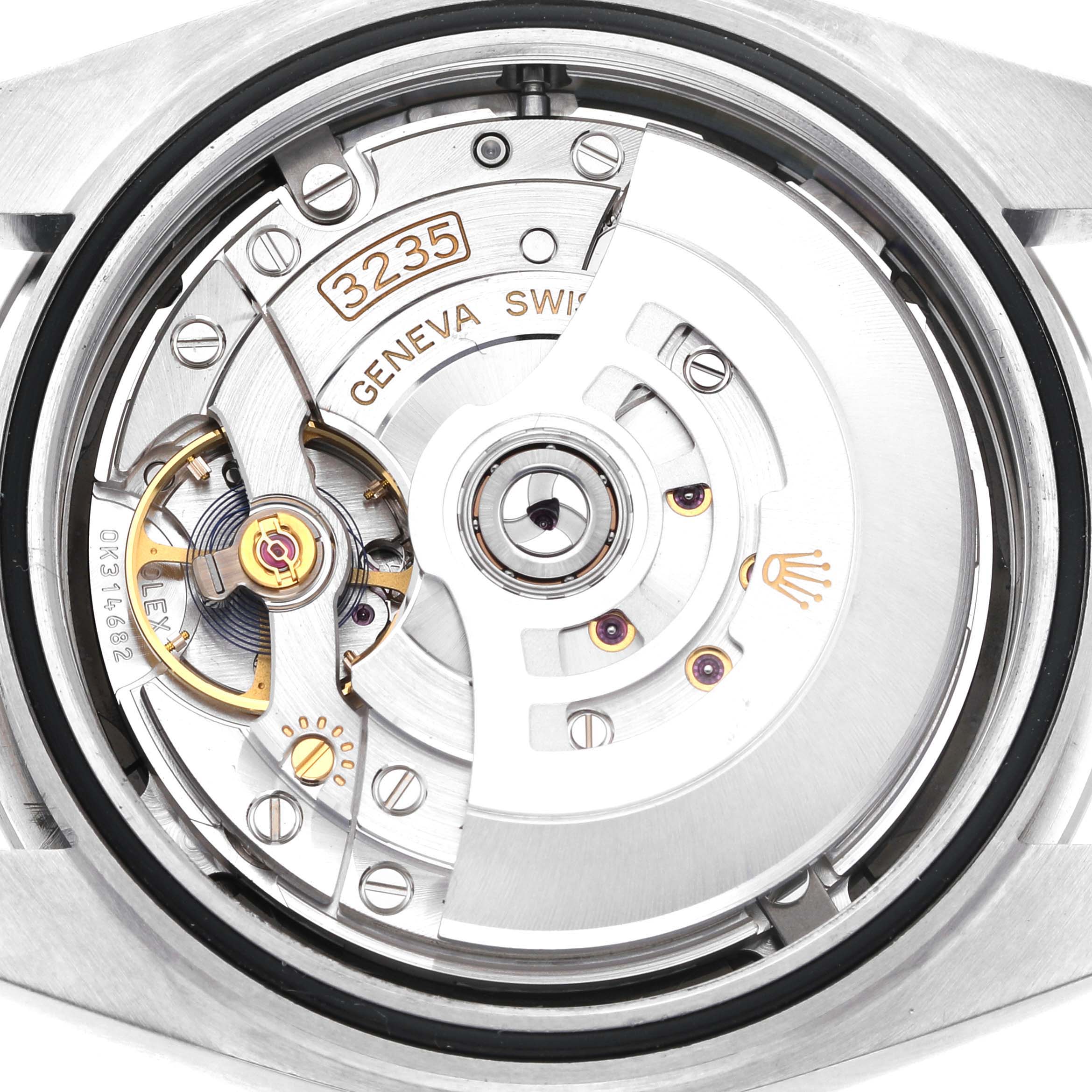 The image shows the back view of a Rolex Datejust 41 ROLEX DATEJUST 41 STEEL BLACK DIAL SMOOTH BEZEL MENS WATCH 126300 Men's Stainless Steel Black Dial, highlighting its intricate movement and rotor.