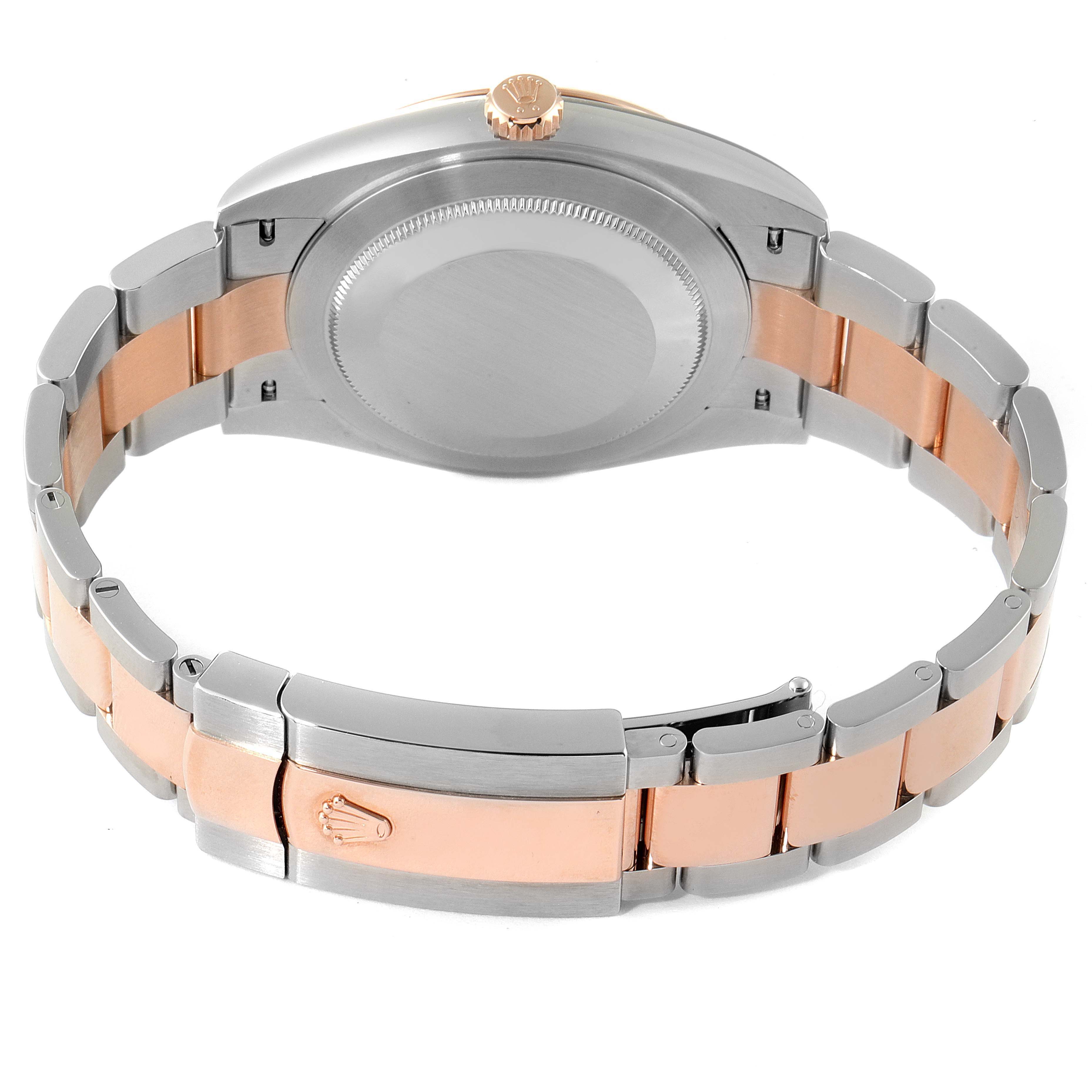 This image shows the back case and bracelet of a Rolex Datejust 41 126331 Men's Steel and Gold (two tone) Beige Dial 126331 Men's Steel and Gold (two tone) Beige Dial, highlighting the two-tone metal and clasp with the Rolex logo.