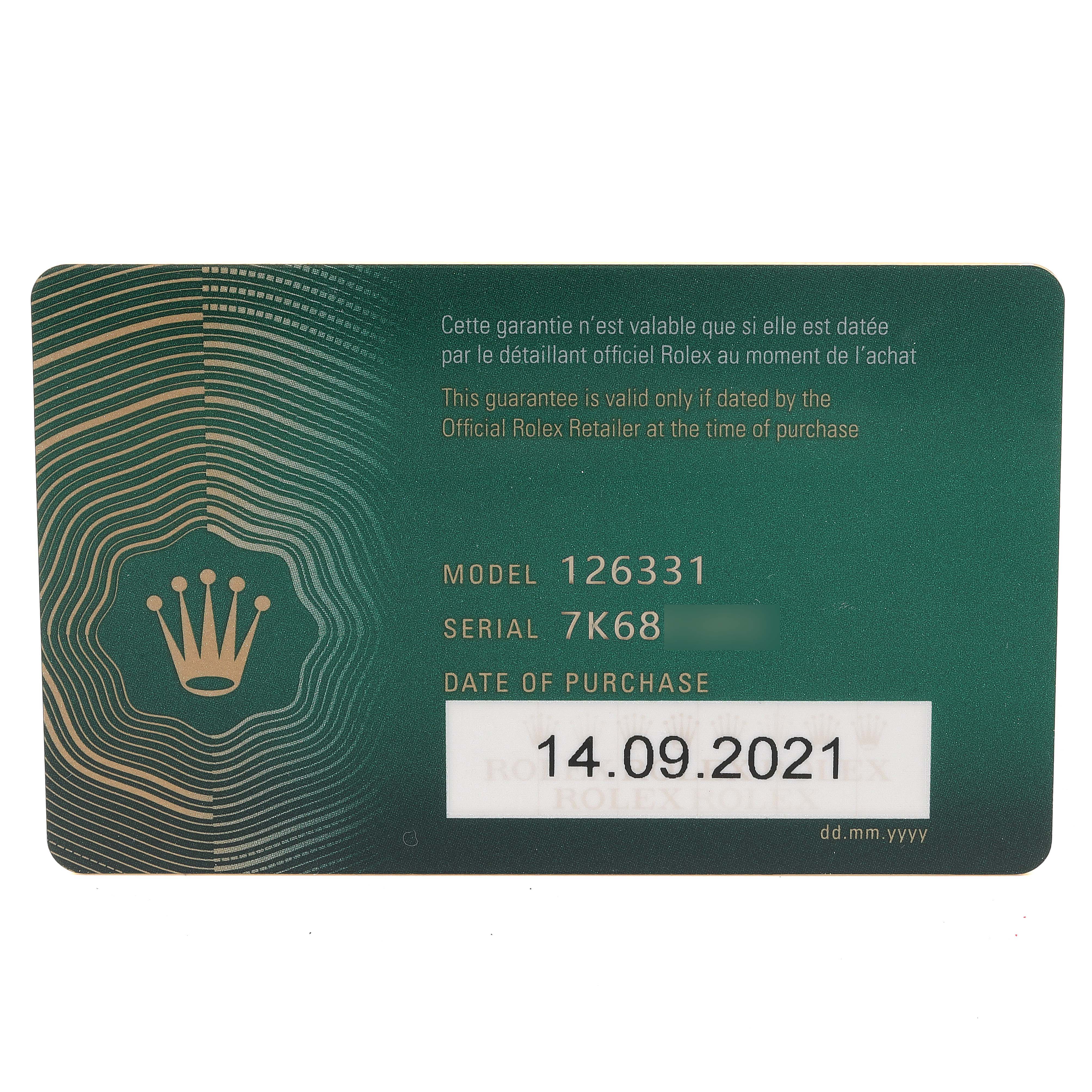 This image shows the warranty card for the Rolex Datejust 41 126331 Men's Steel and Gold (two tone) Beige Dial 126331 Men's Steel and Gold (two tone) Beige Dial model.