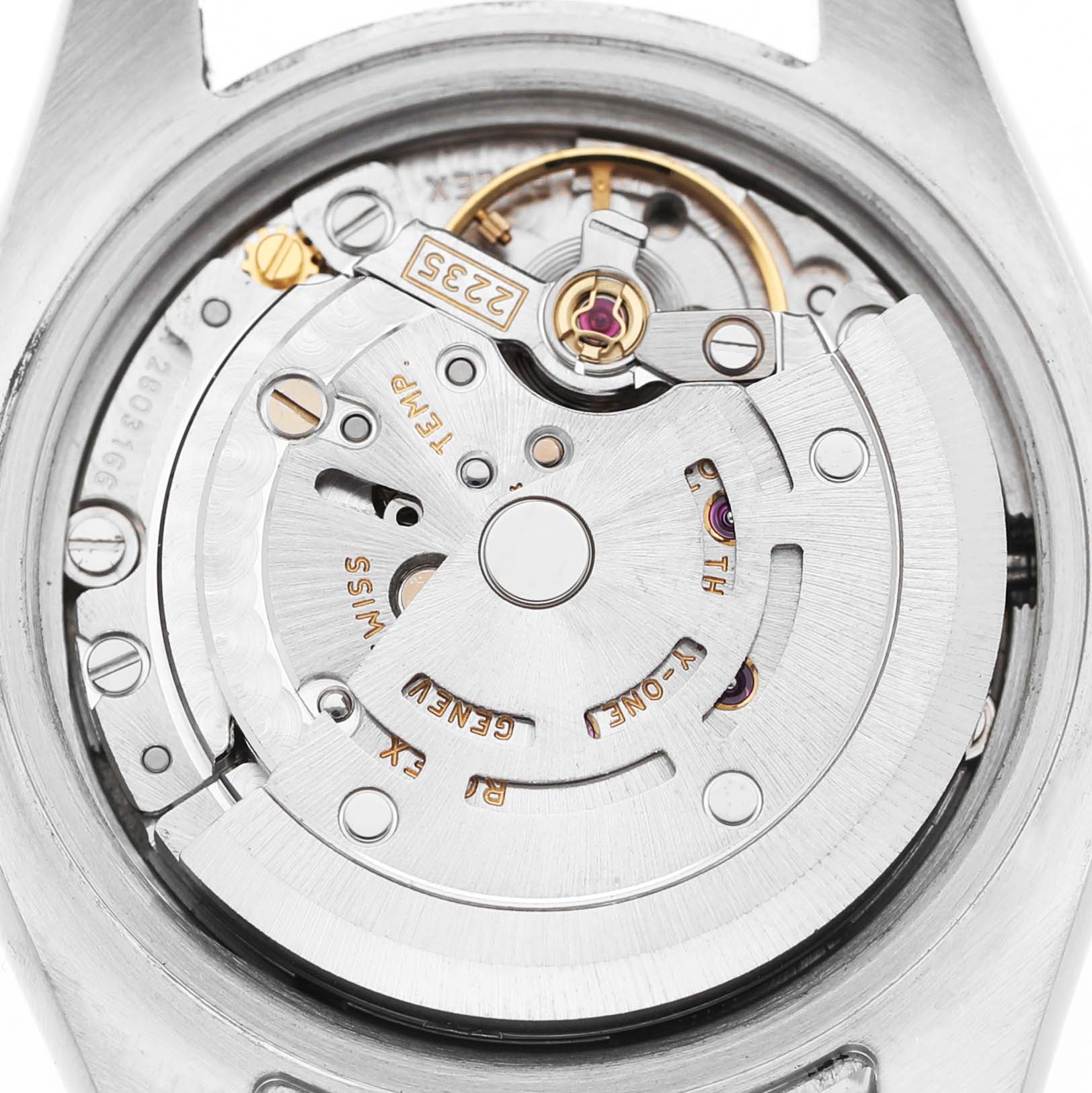 The image shows the movement inside the Rolex Datejust 179173 Women's Steel and Gold (two tone) Blue Dial watch from a top-down angle.