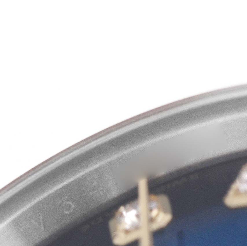 The image shows a close-up of the Datejust's bezel and a number marker by Rolex, with part of the dial and index visible.