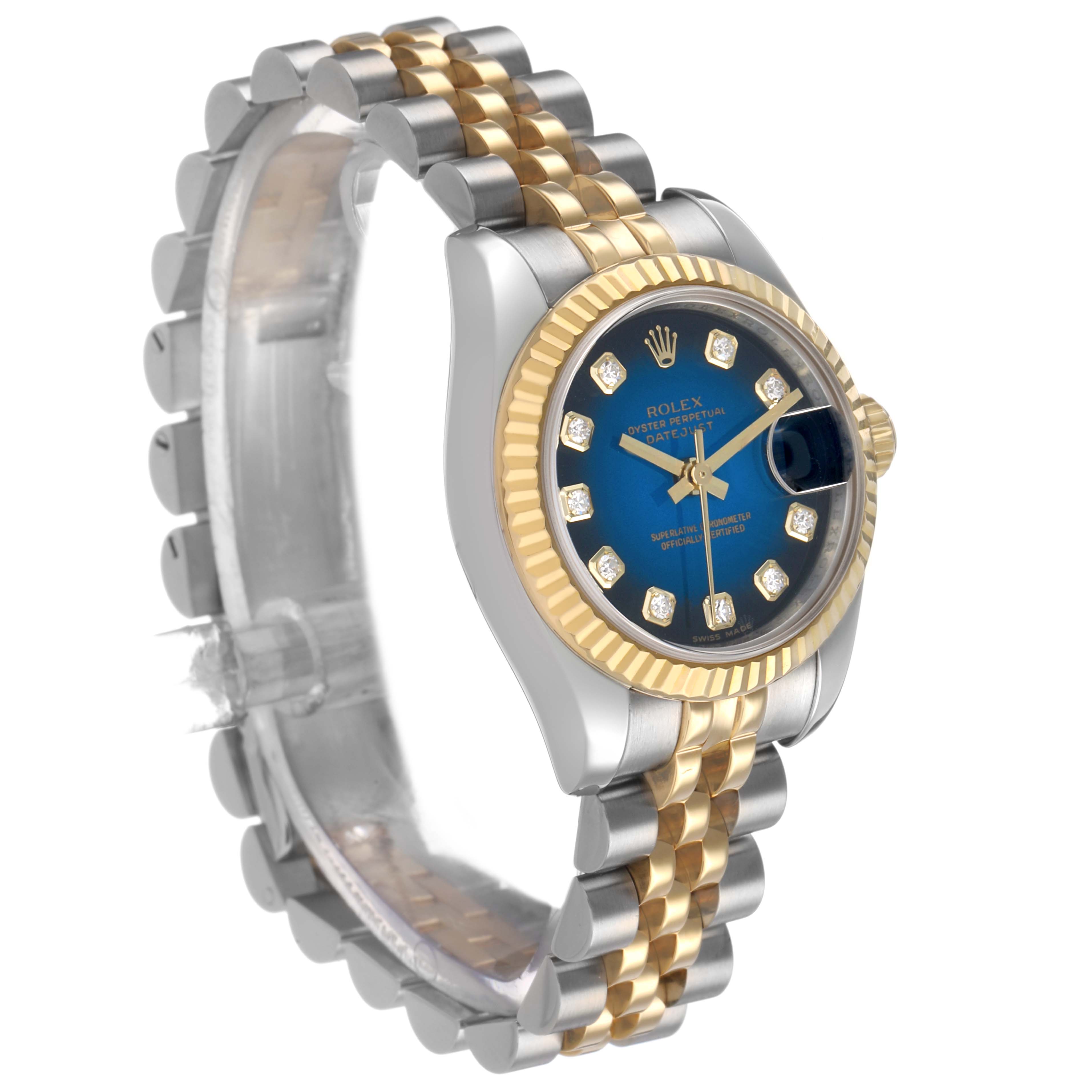 The Rolex Datejust 179173 Women's Steel and Gold (two tone) Blue Dial watch is shown at a three-quarter angle, highlighting its face, bezel, and bracelet.