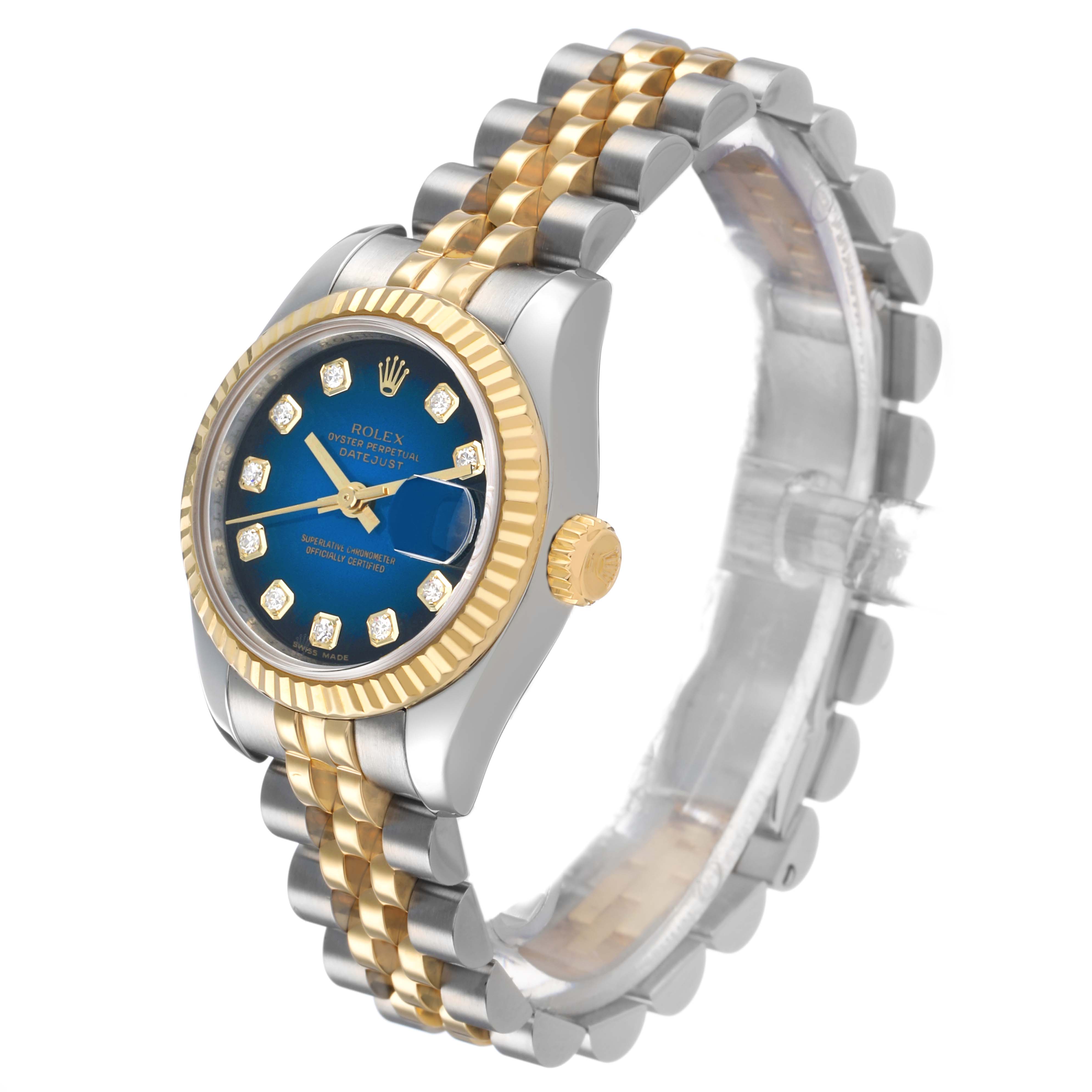 The Rolex Datejust 179173 Women's Steel and Gold (two tone) Blue Dial is shown at a three-quarter angle, highlighting the face, fluted bezel, crown, and two-tone Jubilee bracelet.