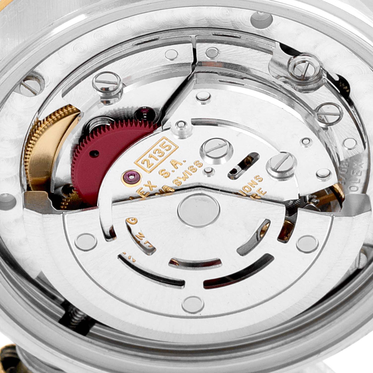 This image shows the inner mechanism of a Rolex Mid-Size 68273 Women's Steel and Gold (two tone) Champagne Dial 68273 Women's Steel and Gold (two tone) Champagne Dial watch, highlighting its movement and gearing.