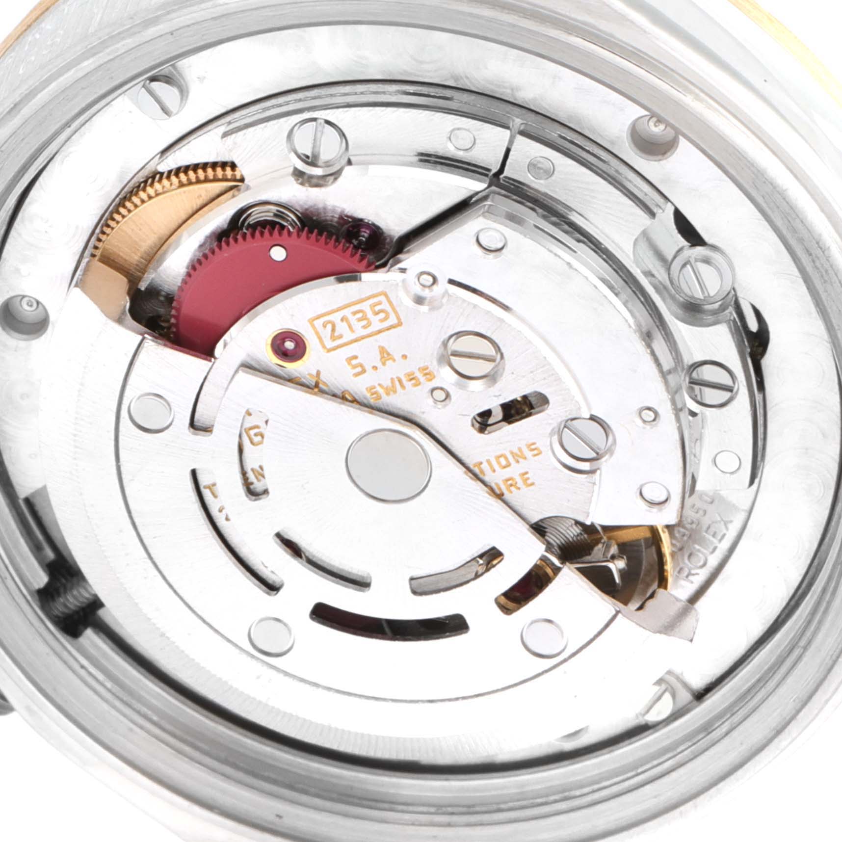 This image shows a close-up of the movement mechanism for a mid-size Rolex watch.