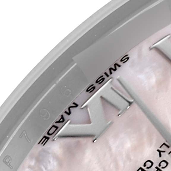 The image shows a close-up of the dial edge of a Rolex Mid-Size 178274 Women's Stainless Steel Mother of Pearl Dial 178274 Women's Stainless Steel Mother of Pearl Dial watch, featuring Roman numeral markers and "Swiss Made" text.