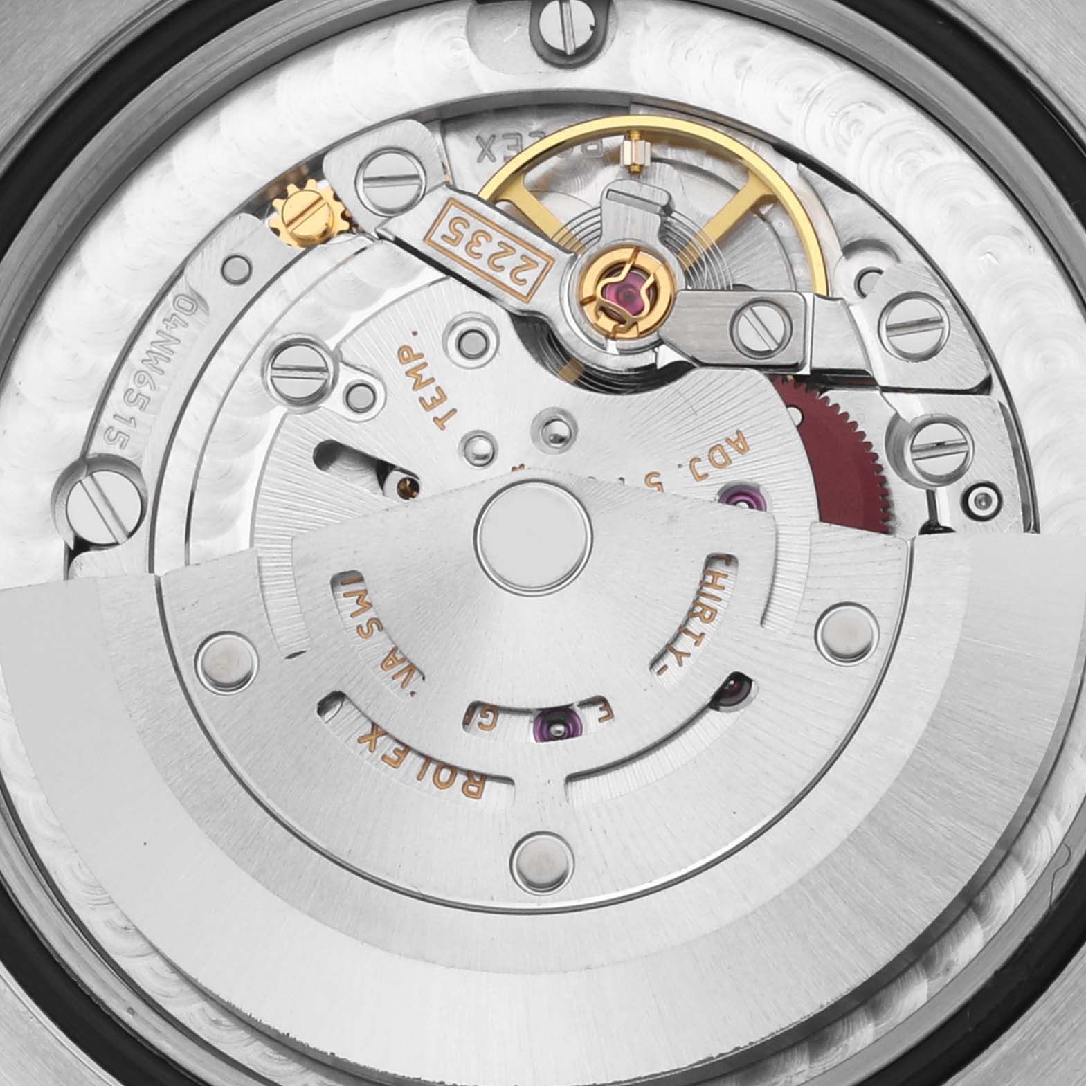 The image shows the movement of a Rolex Mid-Size 178274 Women's Stainless Steel Mother of Pearl Dial 178274 Women's Stainless Steel Mother of Pearl Dial watch from a top-down angle, highlighting the rotor and intricate components.