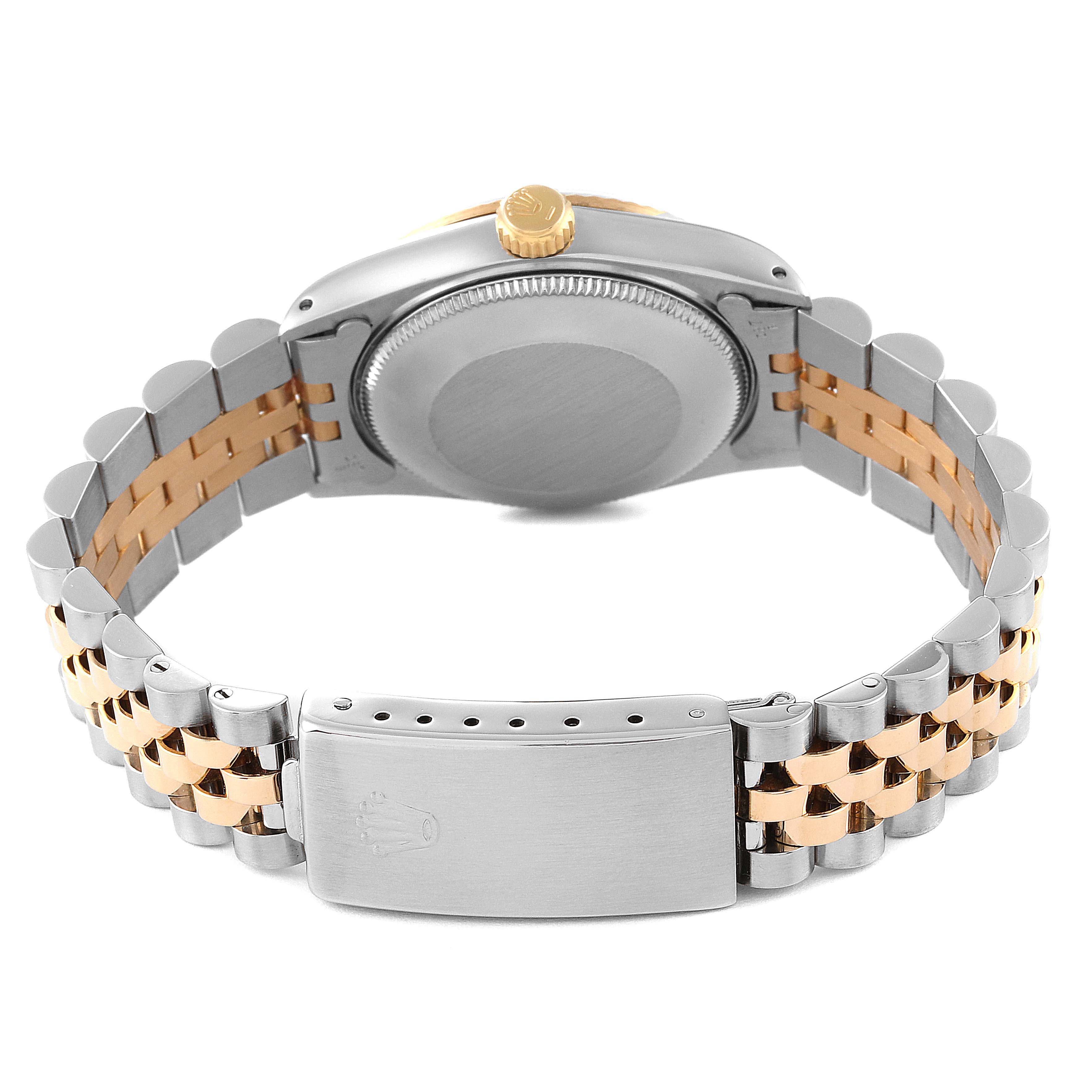 The image shows the back view of the case and bracelet, including the clasp, of a Mid-Size Rolex watch.