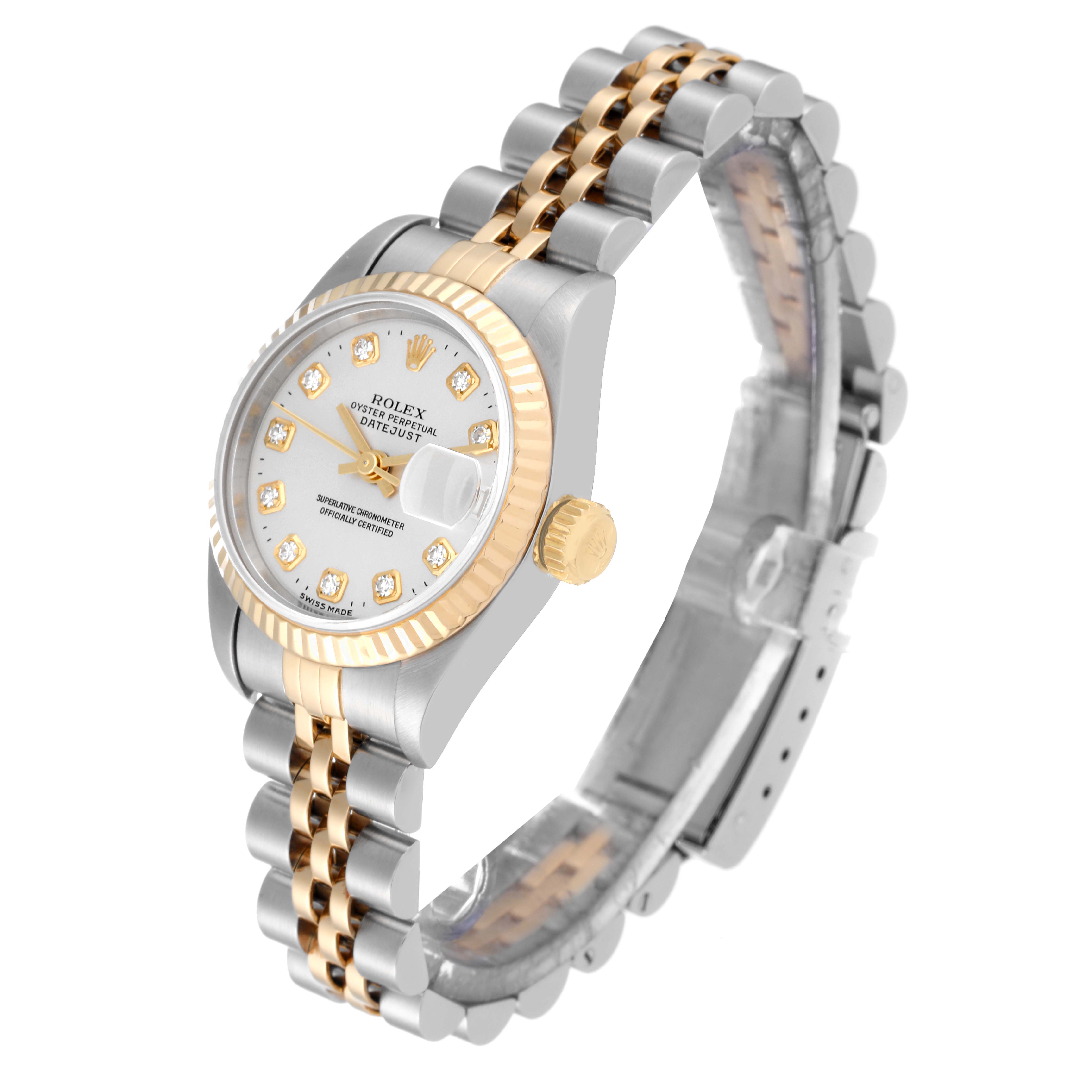The Rolex Datejust 69173 Women's Steel and Gold (two tone) Silver Dial 69173 Women's Steel and Gold (two tone) Silver Dial watch is shown at a three-quarter angle, highlighting its two-tone case, fluted bezel, and jubilee bracelet.