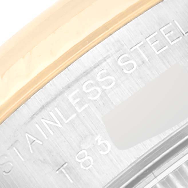 This close-up of the Rolex Datejust 69173 Women's Steel and Gold (two tone) Silver Dial 69173 Women's Steel and Gold (two tone) Silver Dial shows part of the bezel and the engraved text on the case.