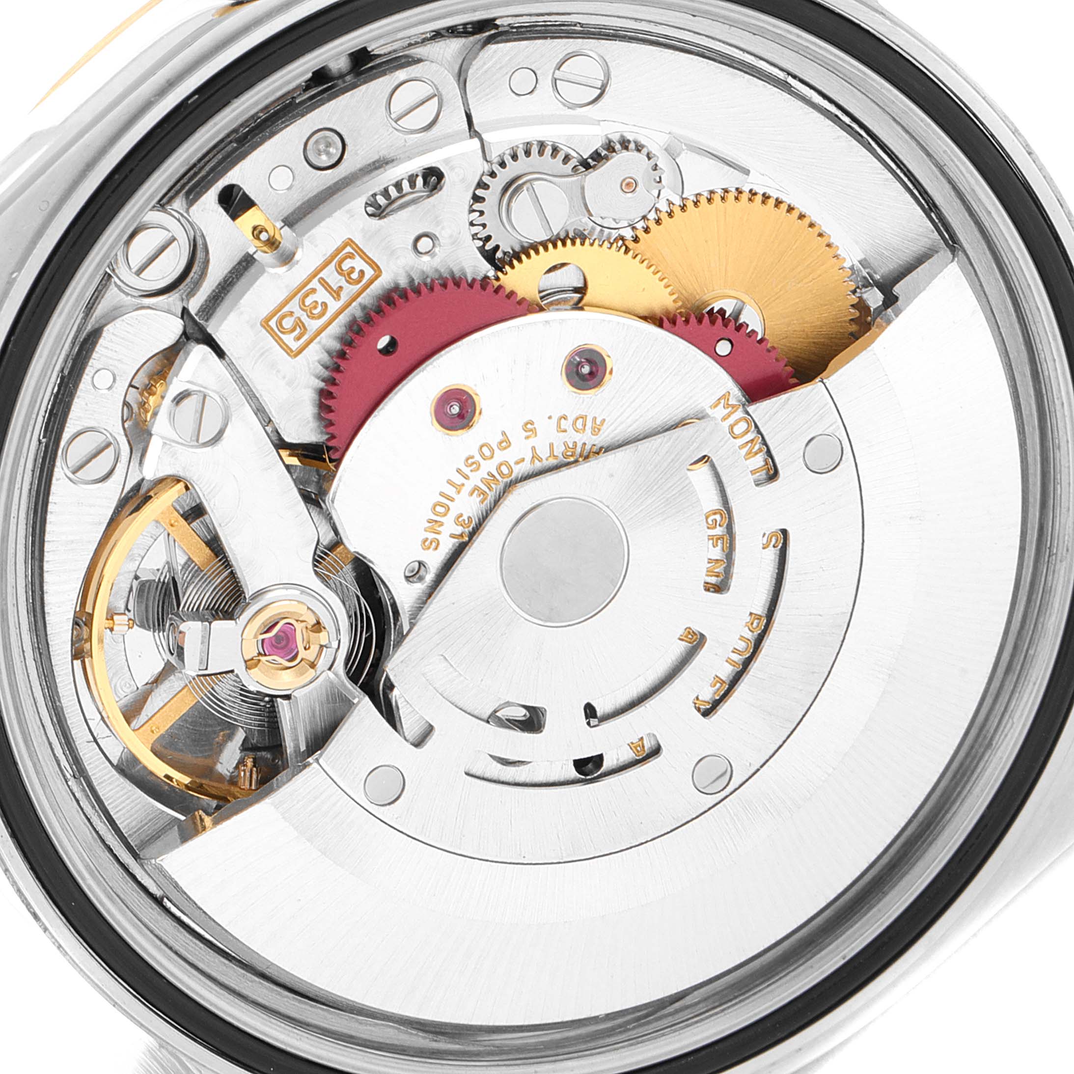 This image shows the intricate inner mechanics of the Rolex Datejust 16233 Men's Steel and Gold (two tone) Champagne Dial 16233 Men's Steel and Gold (two tone) Champagne Dial watch from a top-down angle.