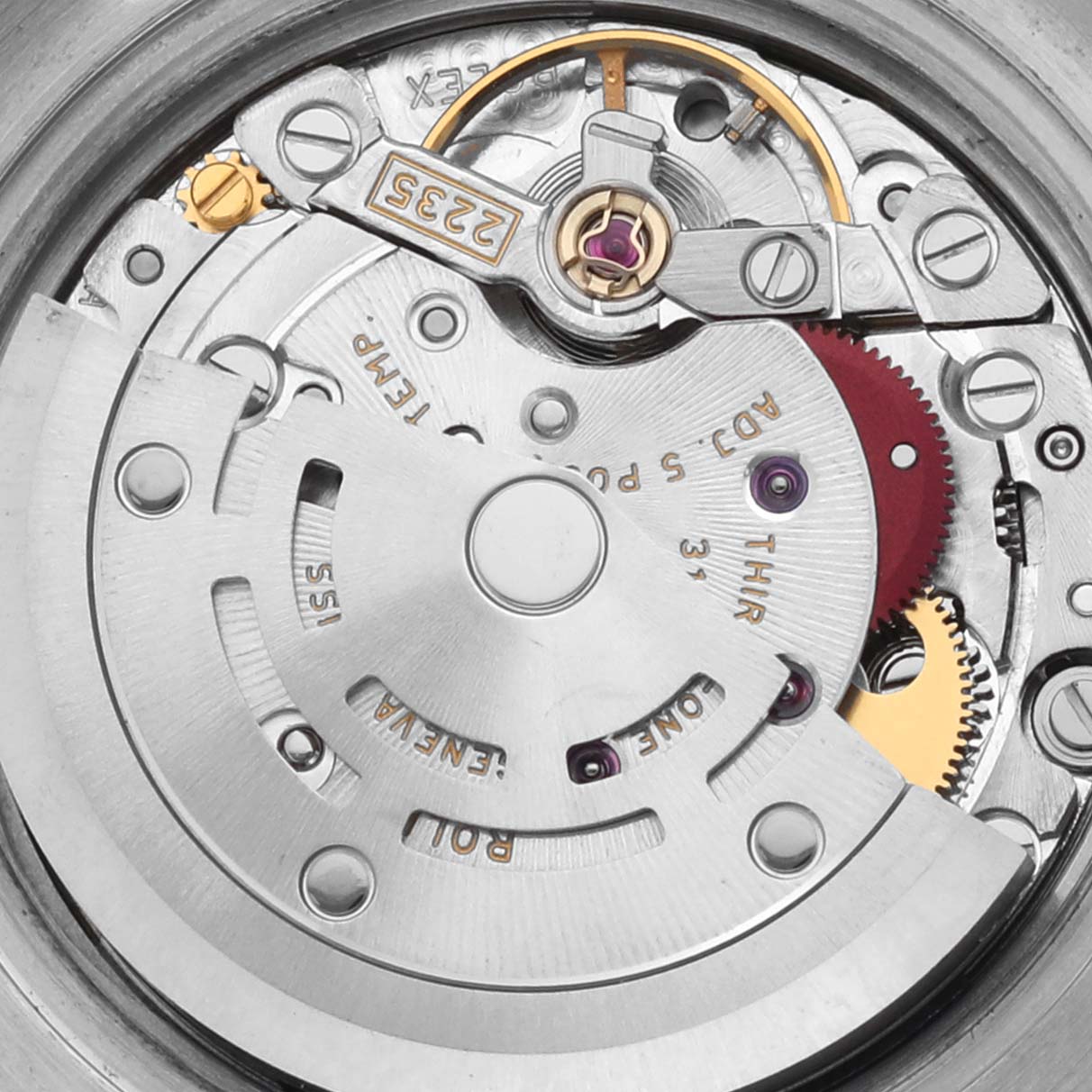 The image shows the movement mechanism of a Rolex Datejust 179171 Women's Steel and Gold (two tone) Pink Dial 179171 Women's Steel and Gold (two tone) Pink Dial watch, highlighting gears and the rotor, viewed from a top angle.