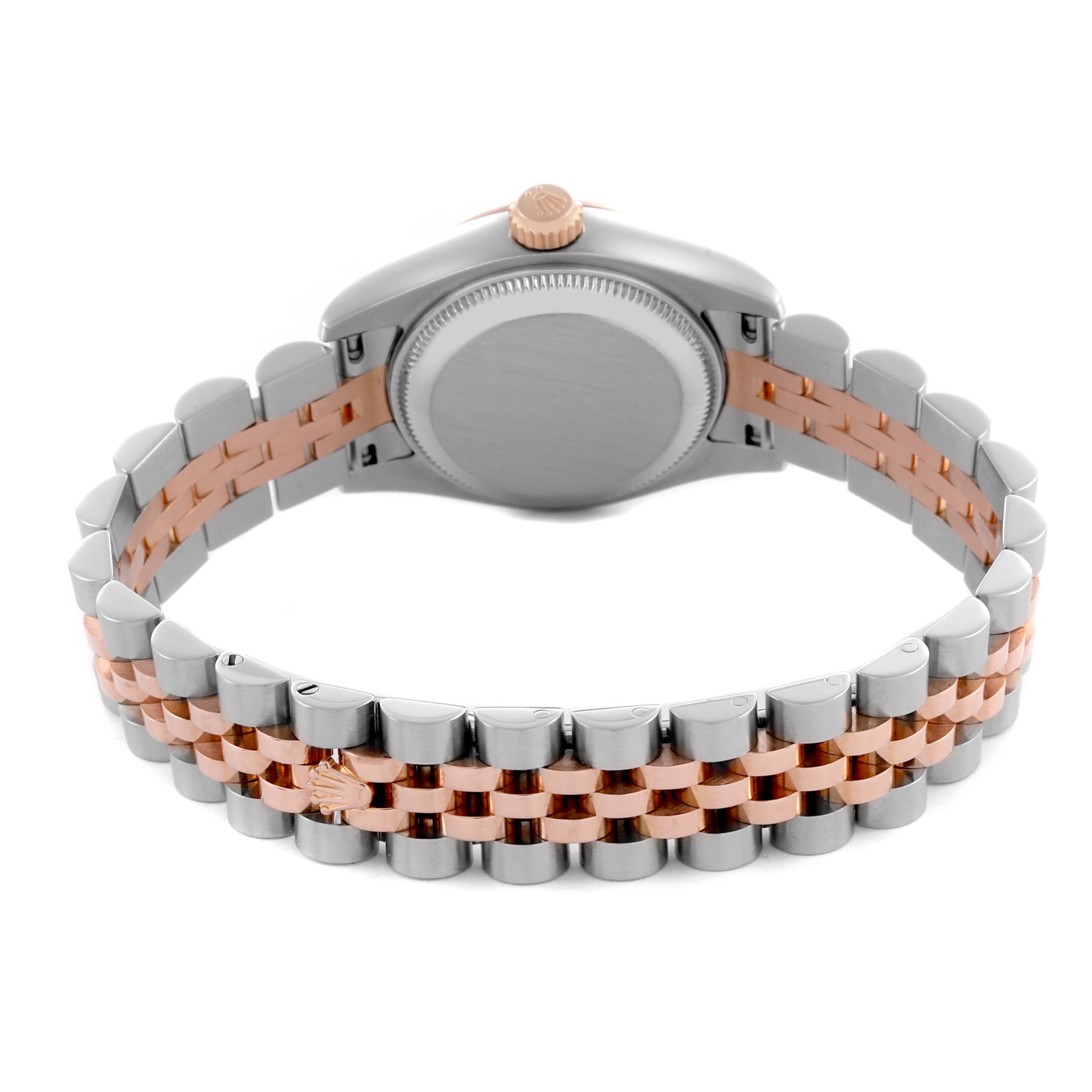 The image displays the back view of a Rolex Datejust 179171 Women's Steel and Gold (two tone) Pink Dial 179171 Women's Steel and Gold (two tone) Pink Dial, showing its clasp and bracelet with a blend of silver and rose gold.