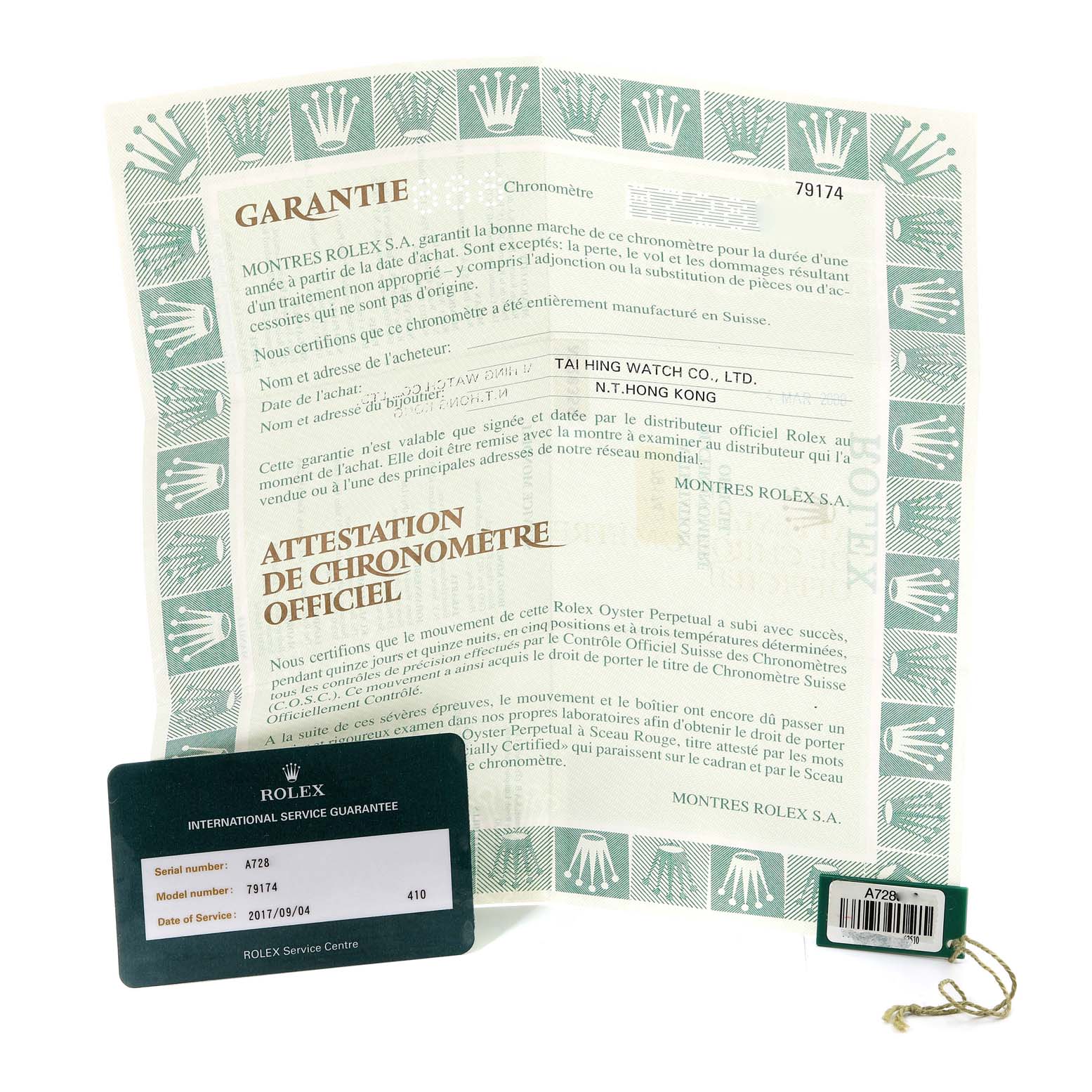 The image shows warranty papers, a service card, and a hang tag for a Rolex Datejust 79174 Women's Stainless Steel Pink Dial 79174 Women's Stainless Steel Pink Dial watch.