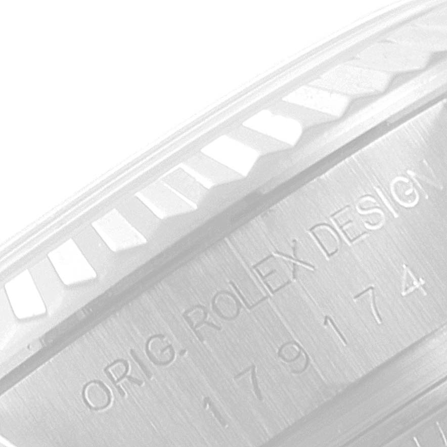 This image shows a close-up angle of the bezel and reference number engraving on a Rolex Datejust 179174 Women's Stainless Steel Pink Dial 179174 Women's Stainless Steel Pink Dial watch.