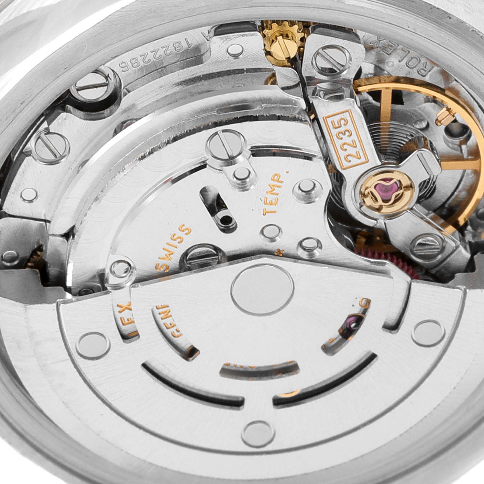 This image shows a close-up of the movement mechanism inside a Rolex Datejust 179174 Women's Stainless Steel Pink Dial 179174 Women's Stainless Steel Pink Dial watch.
