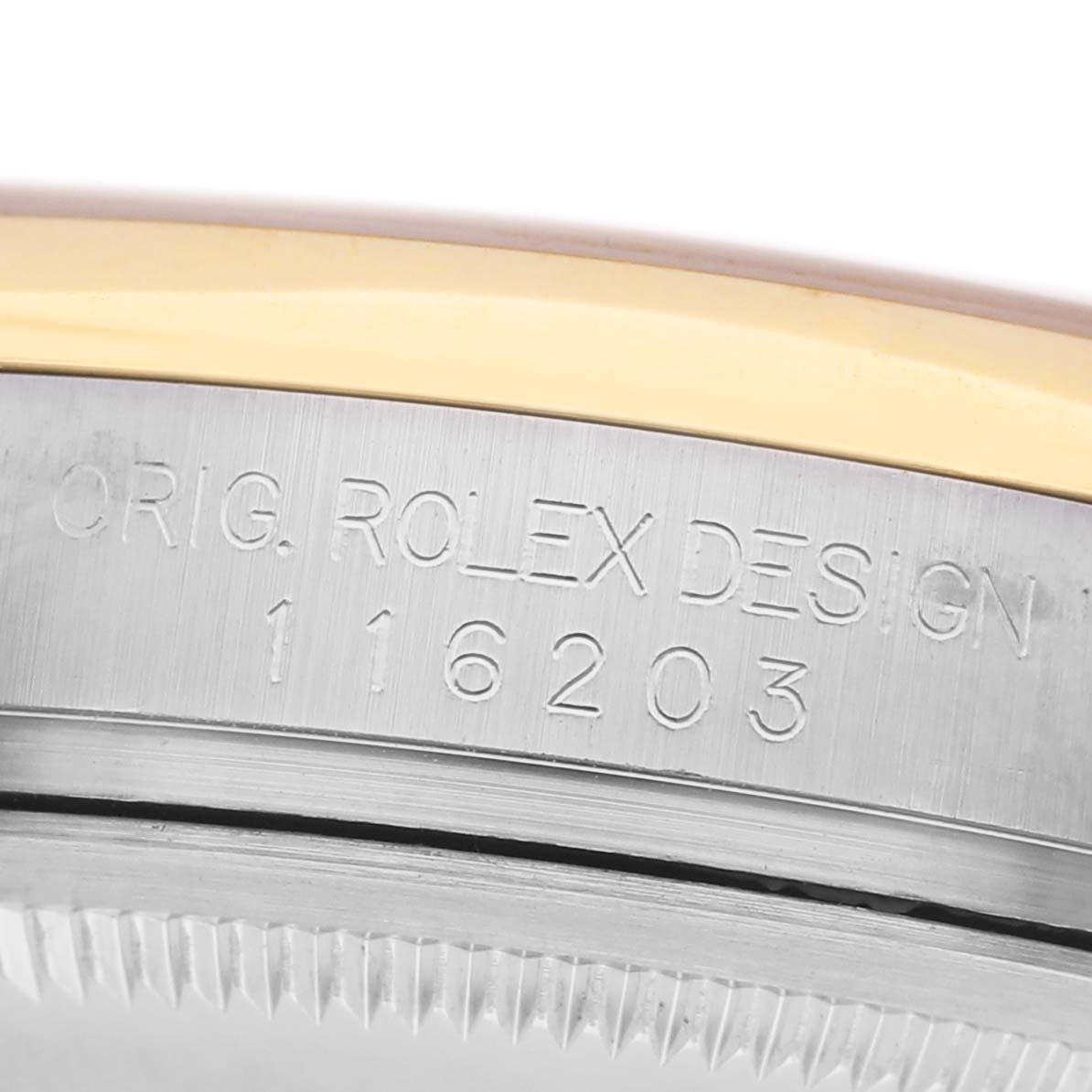 The image shows the side view of a Rolex Datejust 116203 Men's Steel and Gold (two tone) Mother of Pearl Dial case with engraved model number and design information.
