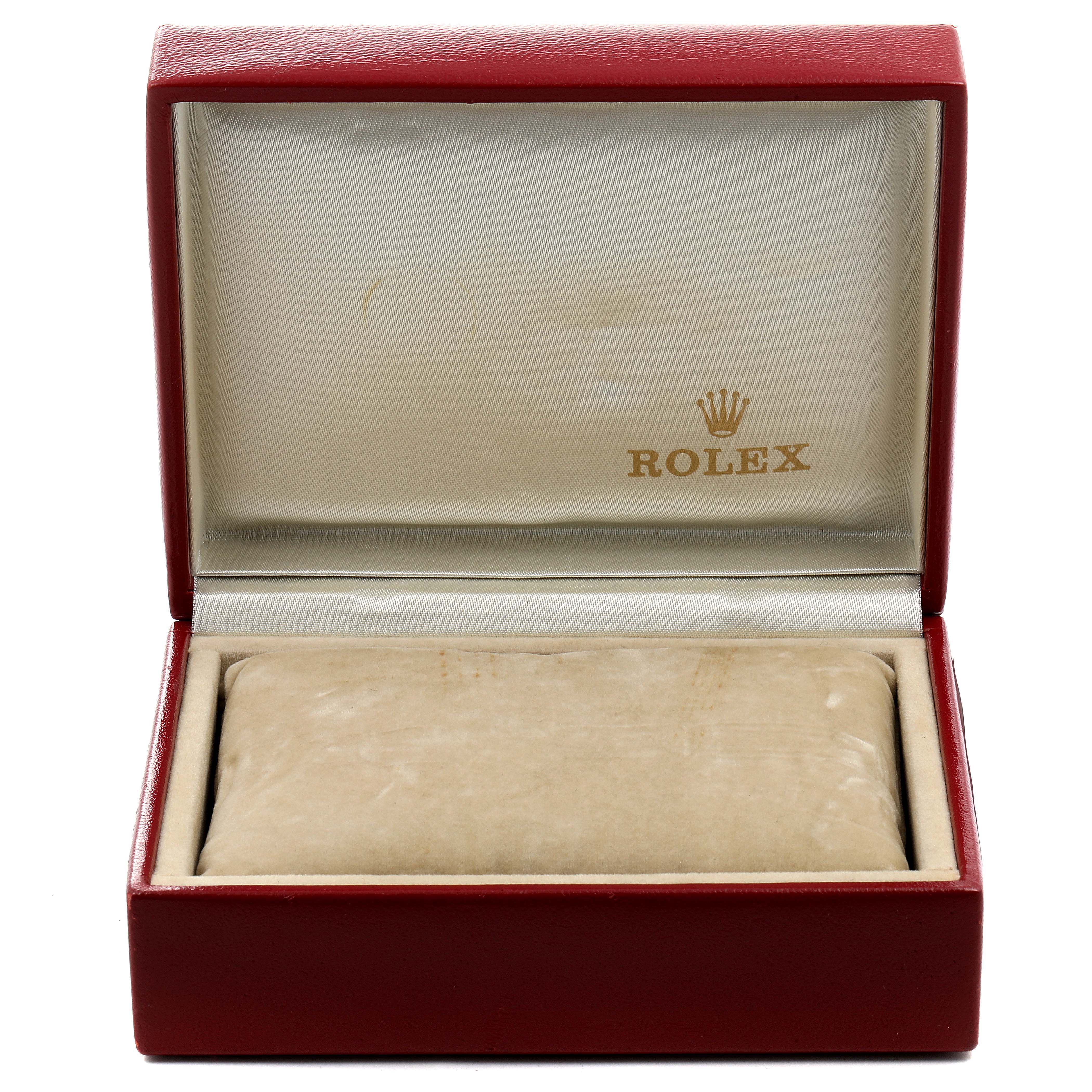 This is an open, empty Rolex Datejust 69173 Women's Steel and Gold (two tone) Silver Dial 69173 Women's Steel and Gold (two tone) Silver Dial watch box, showing the interior and the Rolex logo.