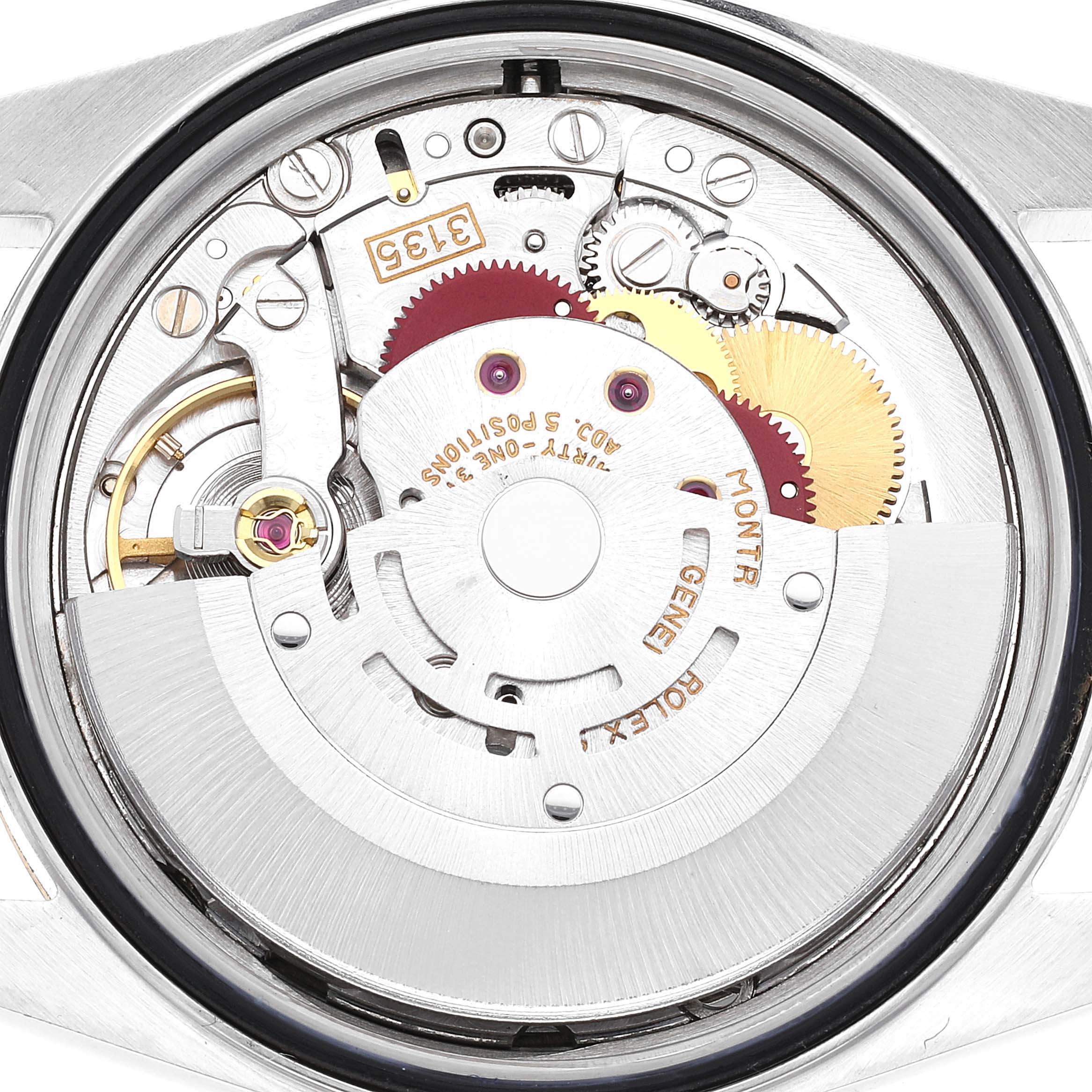 This image shows a close-up view of the movement mechanism inside a Rolex Datejust 16233 Men's Steel and Gold (two tone) White Dial 16233 Men's Steel and Gold (two tone) White Dial watch.