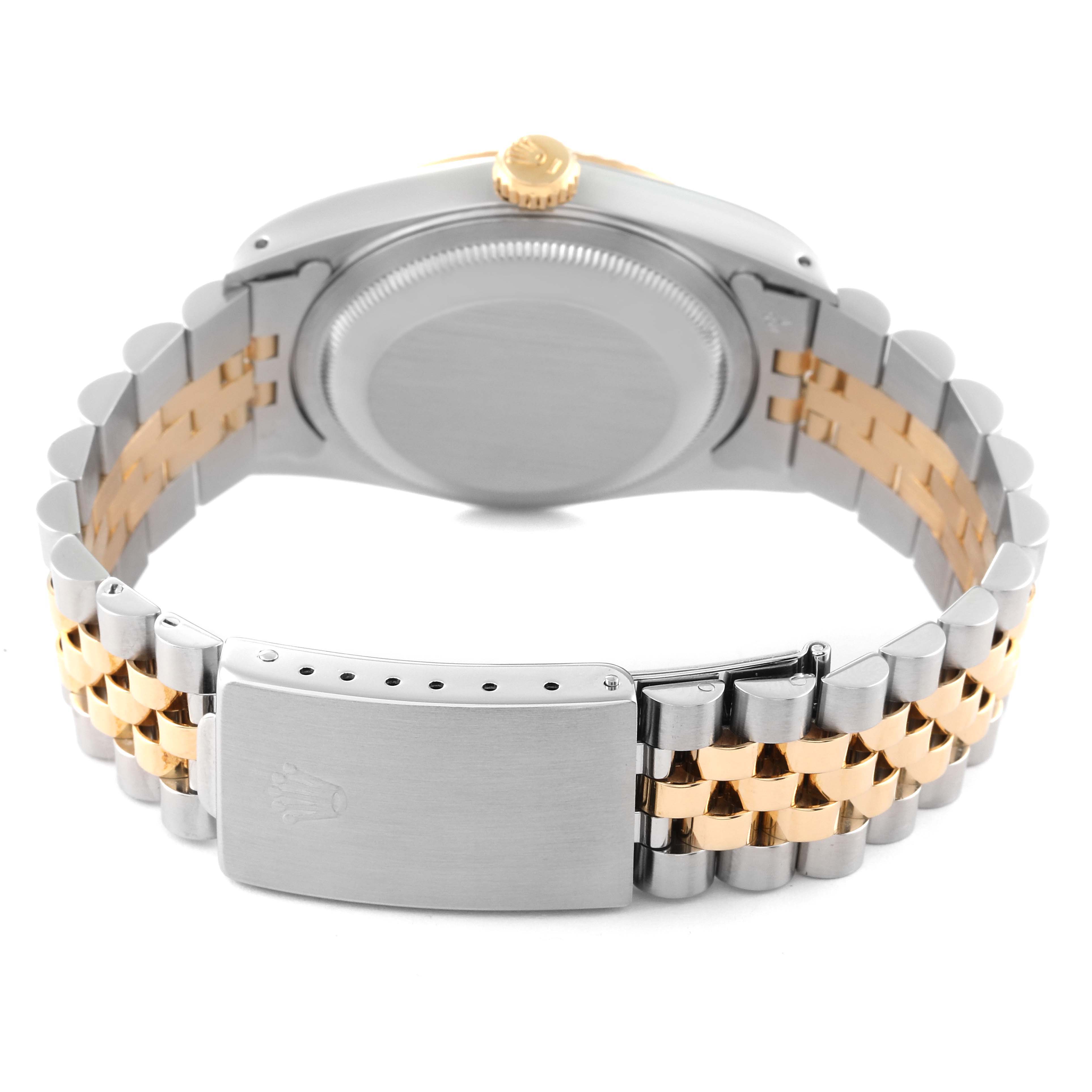 The image shows the back view of the Rolex Datejust 16233 Men's Steel and Gold (two tone) White Dial 16233 Men's Steel and Gold (two tone) White Dial watch, focusing on the case back, crown, and two-tone bracelet with the clasp.