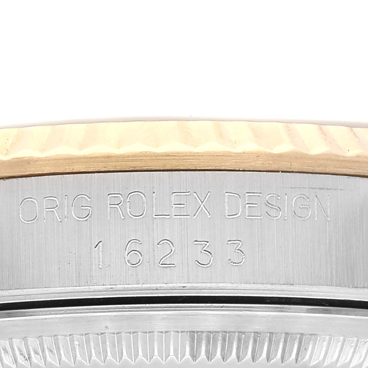 This close-up image shows the side of a Rolex Datejust 16233 Men's Steel and Gold (two tone) White Dial 16233 Men's Steel and Gold (two tone) White Dial model watch, highlighting the case reference number engraved on the side.