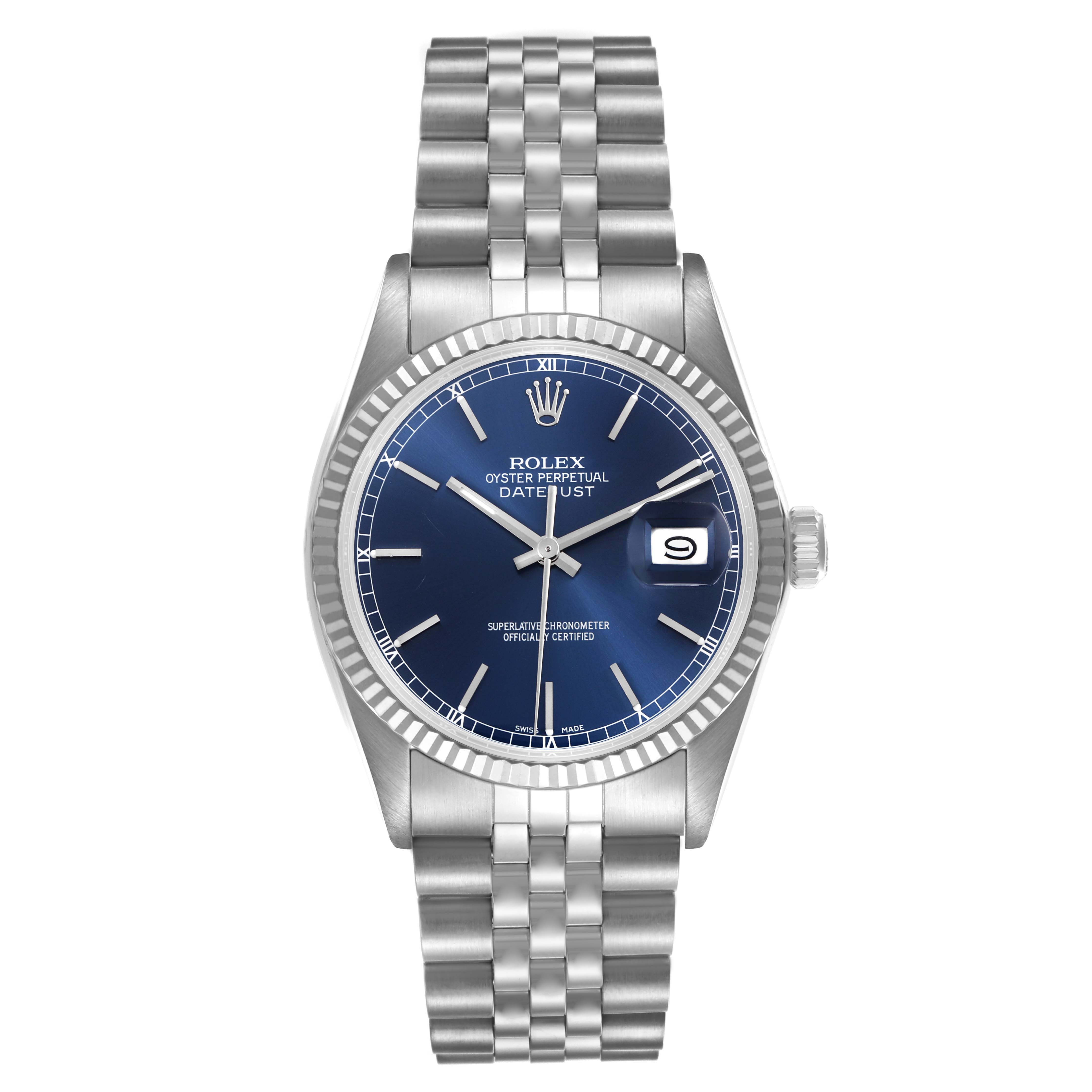 The Rolex Datejust 16014 Men's Stainless Steel Blue Dial 16014 Men's Stainless Steel Blue Dial watch is shown from the front, displaying the blue dial, fluted bezel, and Jubilee bracelet.