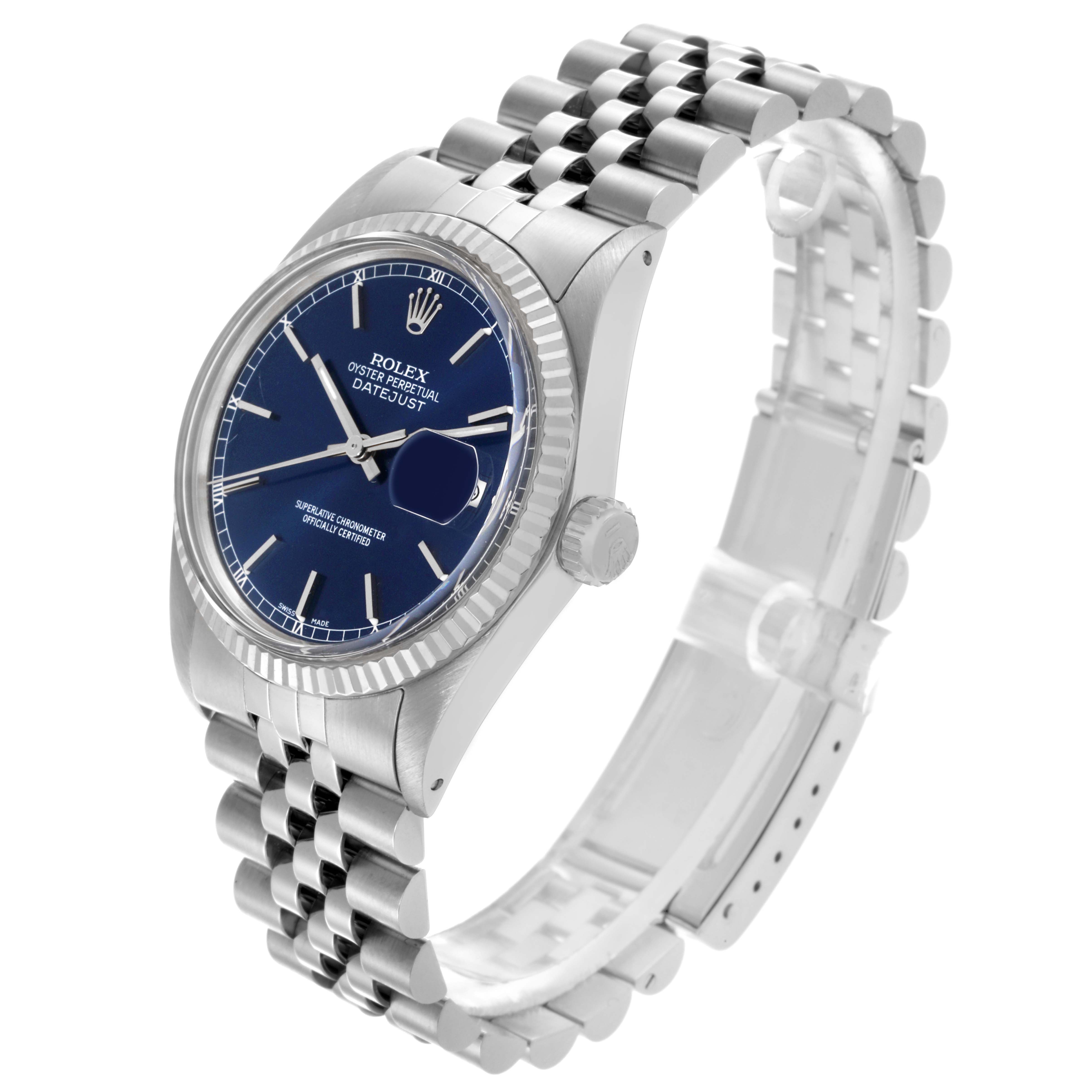 The Rolex Datejust 16014 Men's Stainless Steel Blue Dial 16014 Men's Stainless Steel Blue Dial watch is shown at a slight angle, highlighting the blue dial, fluted bezel, and jubilee bracelet.