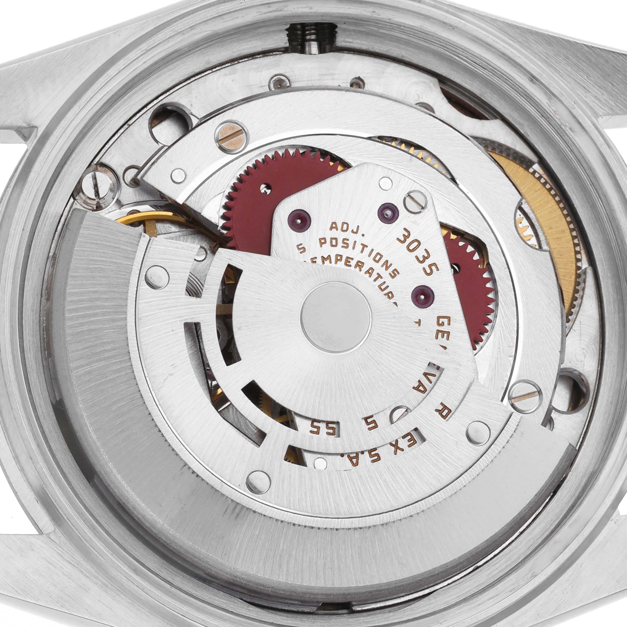 The image shows the internal movement of a Rolex Datejust 16014 Men's Stainless Steel Blue Dial 16014 Men's Stainless Steel Blue Dial, focusing on gears and mechanisms from a top-down angle.