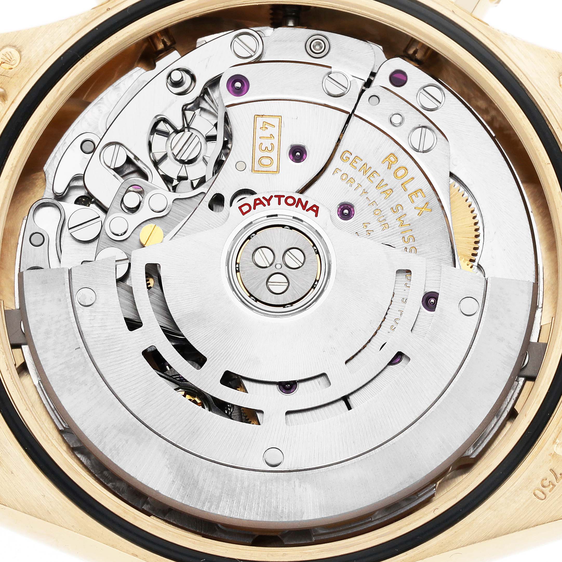 The image shows a close-up of the movement of a Rolex Daytona 116528 Men's Yellow Gold Champagne Dial 116528 Men's Yellow Gold Champagne Dial watch, highlighting the rotor and intricate internal gears.