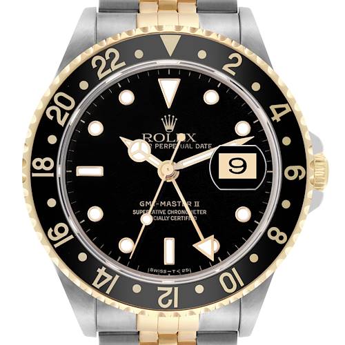 The Rolex GMT-Master II watch is shown from the front, highlighting its black dial, gold details, and date window.