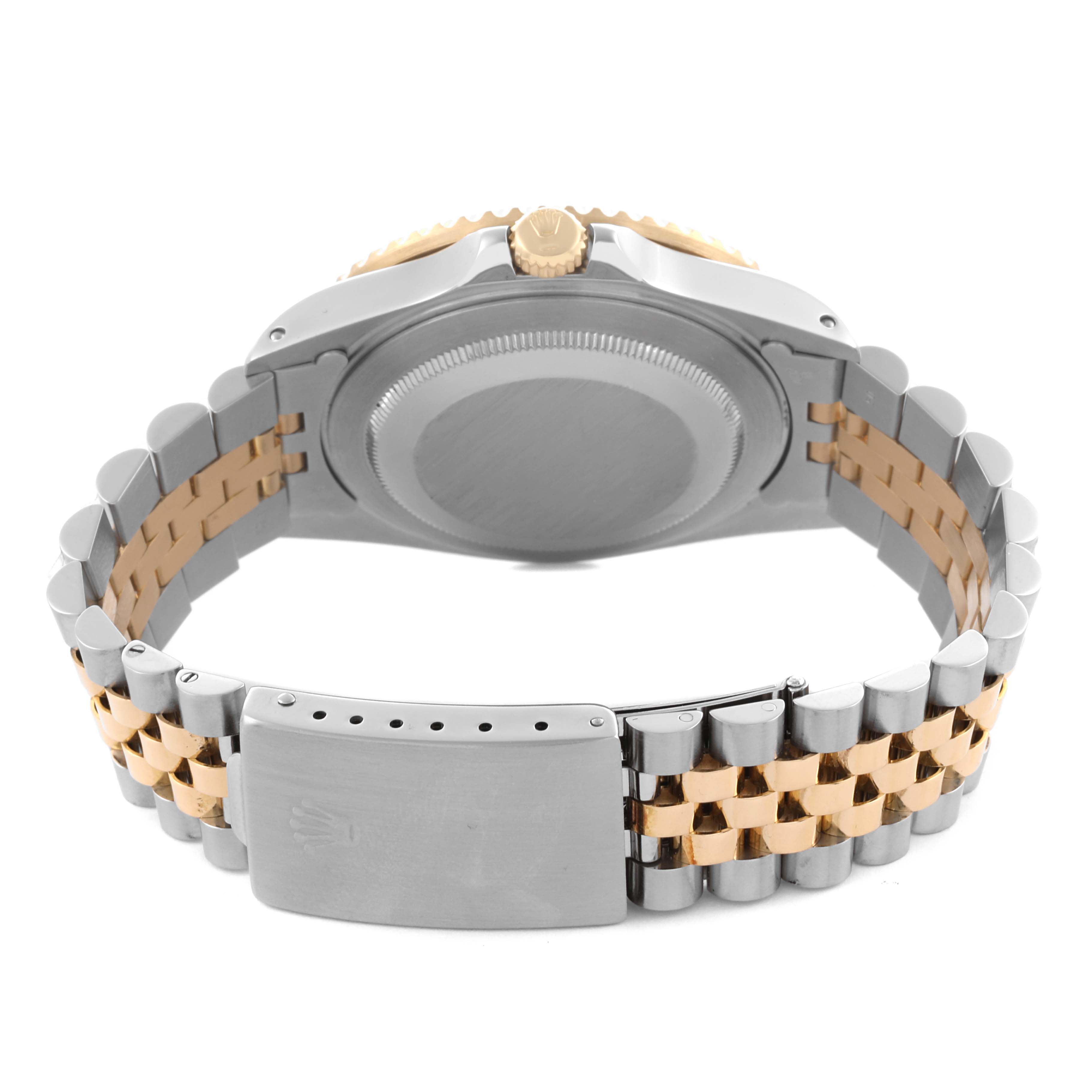 The image shows the back of a Rolex GMT-Master 16713 Men's Steel and Gold (two tone) Black Dial 16713 Men's Steel and Gold (two tone) Black Dial watch, focusing on the case back, crown, and Jubilee bracelet.