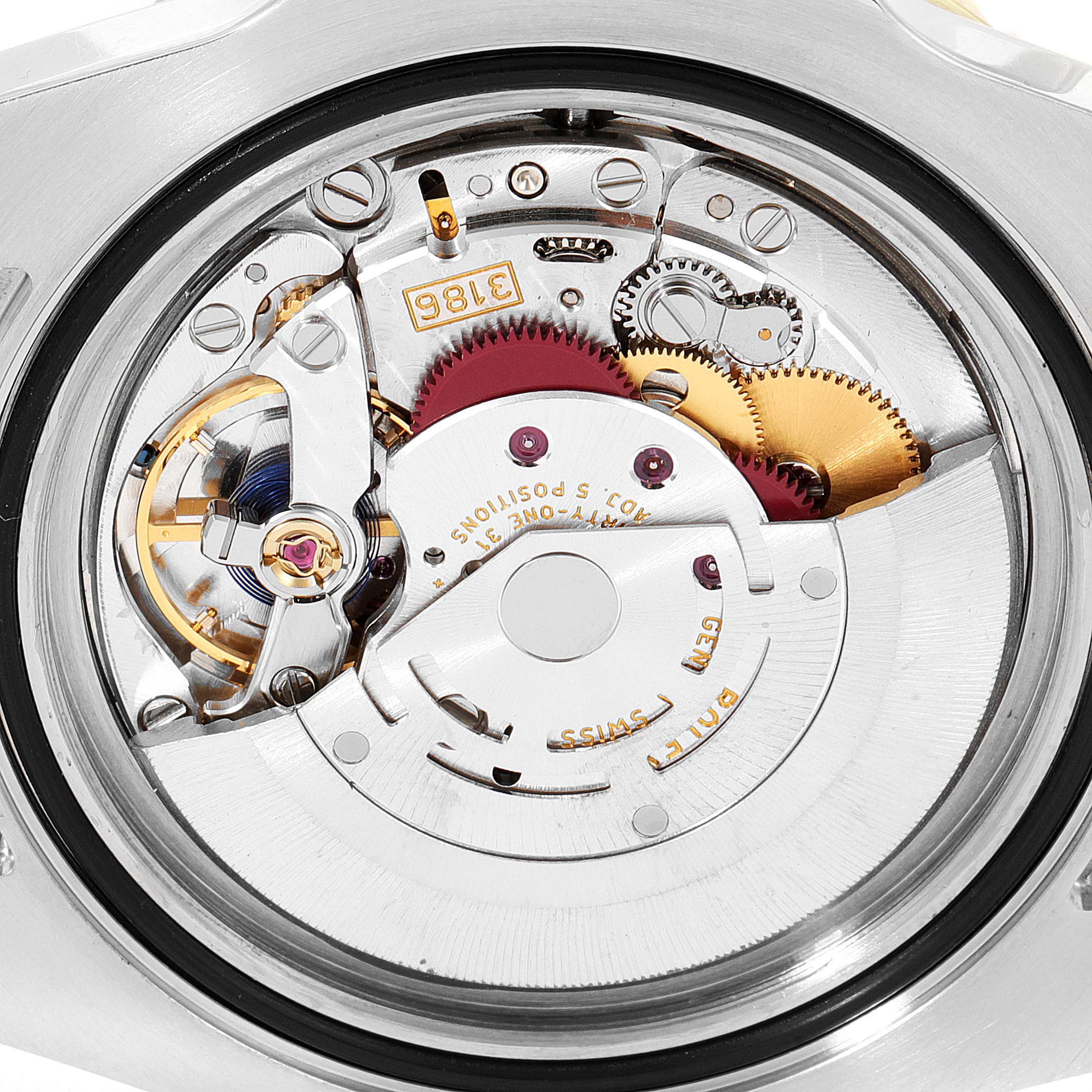 The image shows the intricate internal movement mechanism of the Rolex GMT-Master 116713 Men's Steel and Gold (two tone) Black Dial 116713 Men's Steel and Gold (two tone) Black Dial watch, viewed from the back.