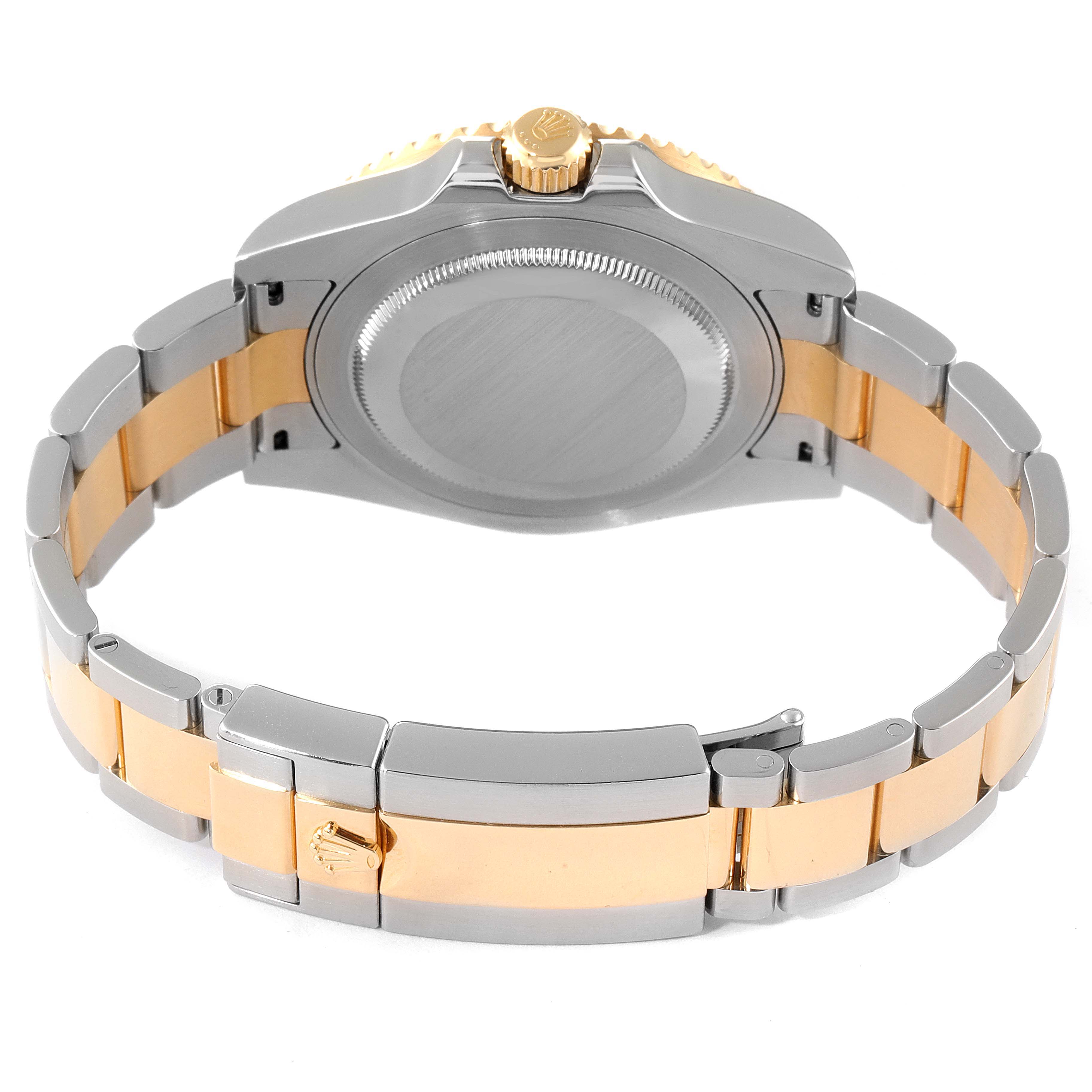 The image shows the back of a Rolex GMT-Master 116713 Men's Steel and Gold (two tone) Black Dial 116713 Men's Steel and Gold (two tone) Black Dial watch, including the case back, crown, and two-tone bracelet.
