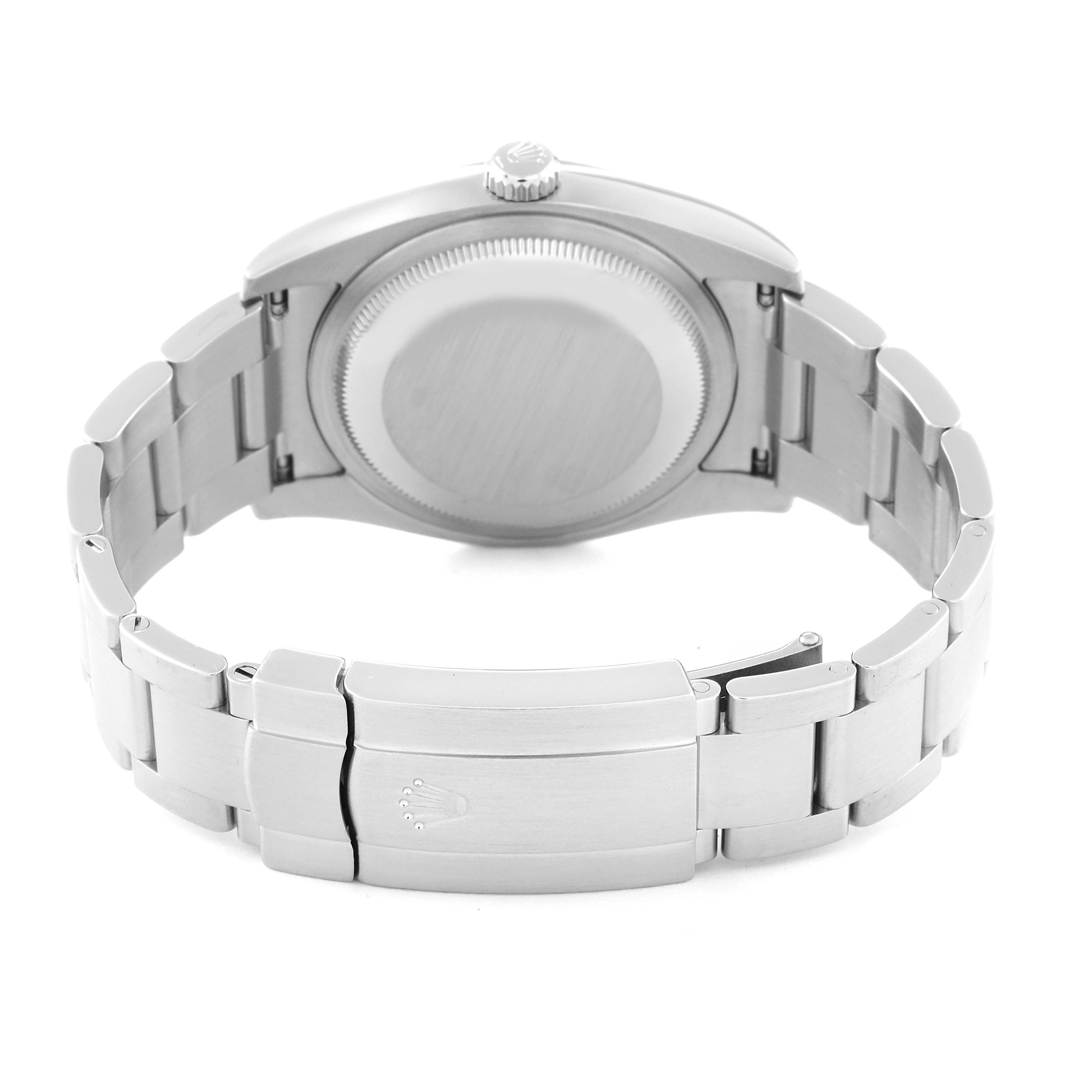 This image shows the back case and clasp of a Rolex Oyster Perpetual 116000 Men
s Stainless Steel Blue Dial 116000 Men
s Stainless Steel Blue Dial watch, featuring its metal bracelet.