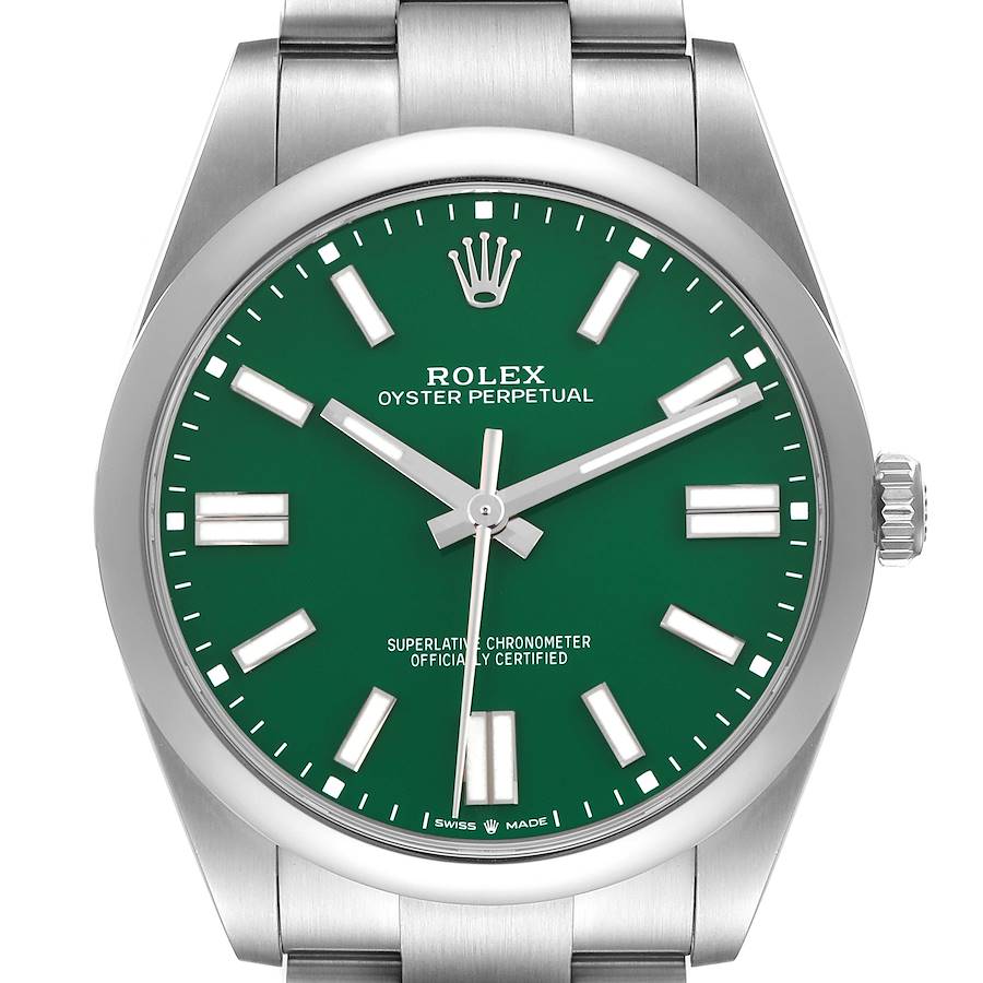 The Rolex Oyster Perpetual watch is shown from the front, displaying the green dial and part of the stainless steel bracelet.