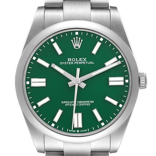 The Rolex Oyster Perpetual watch is shown from the front, highlighting its green dial, crown, and stainless steel bracelet.