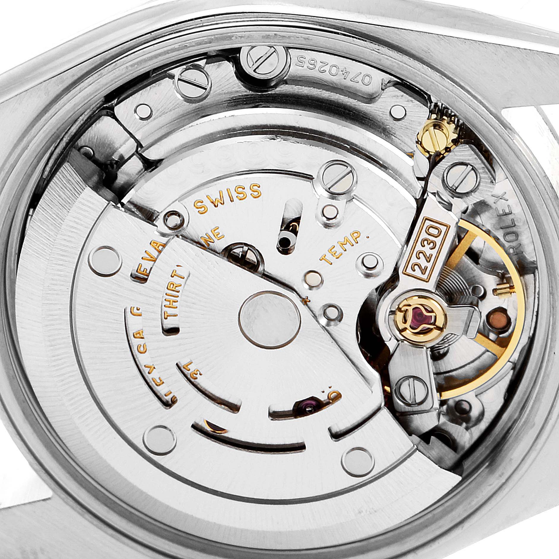 The image shows a close-up view of the movement and internal mechanisms of a Rolex Oyster Perpetual 76080 Women's Stainless Steel Pink Dial 76080 Women's Stainless Steel Pink Dial watch.